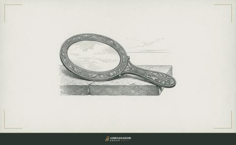 Antique engraving illustration. A hand mirror laid flat on a stone surface, reflecting only sky, its frame engraved with fine hatched ornamentation.