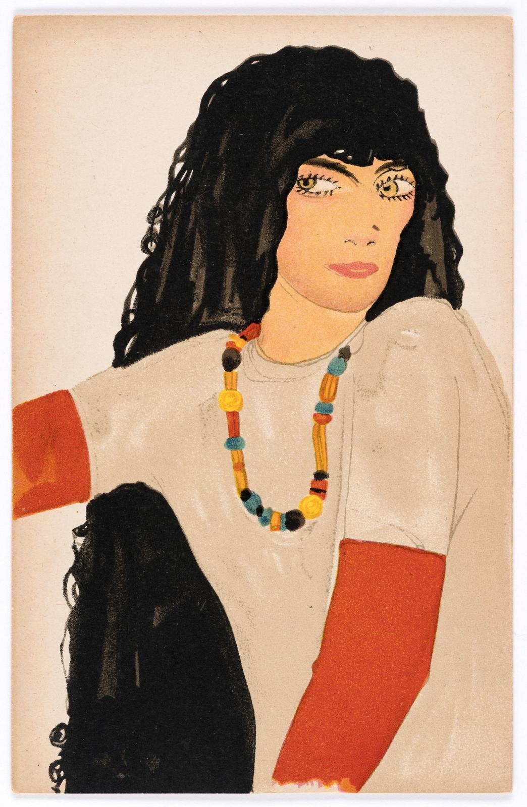 Portrait of woman with black wavy hair wearing colorful beaded necklace and white top with red geometric design