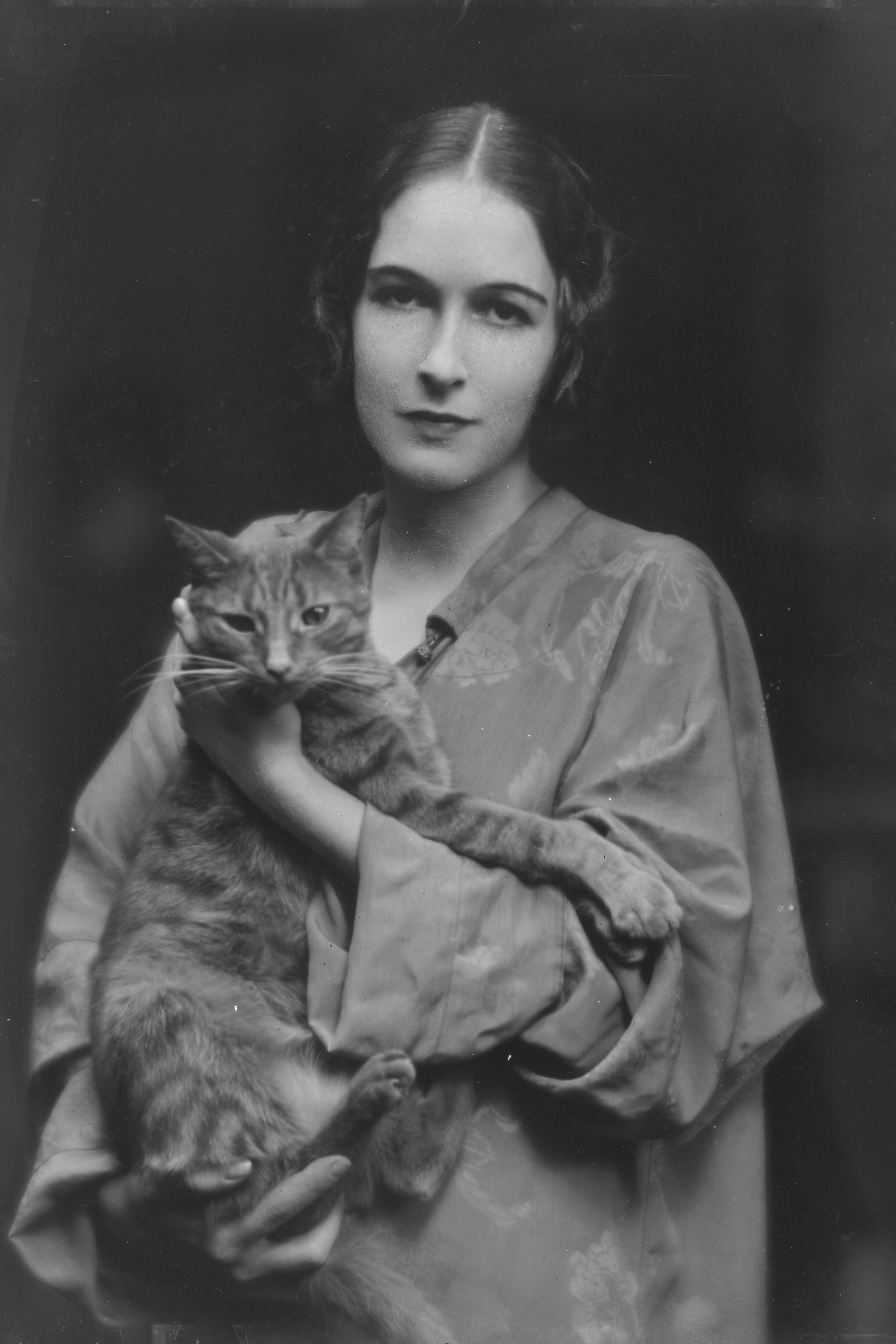 Miss Mona Pujo with Buzzer the Cat