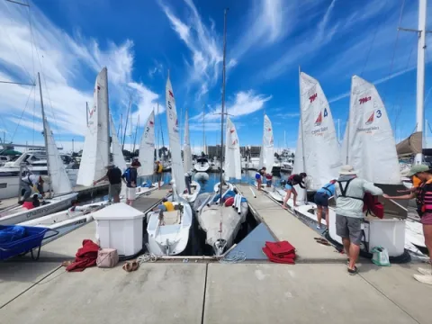 Volunteers hustling to getting everything ready before the sail.