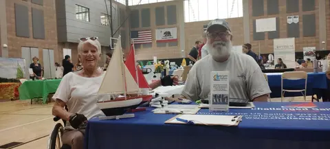 Dan and Penny spreading the word
