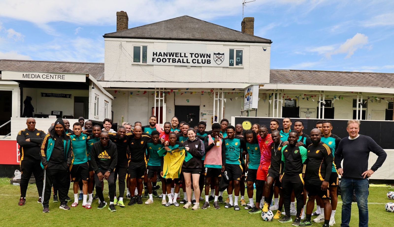 The Jamaica squad outside Hanwell Town's clubhouse