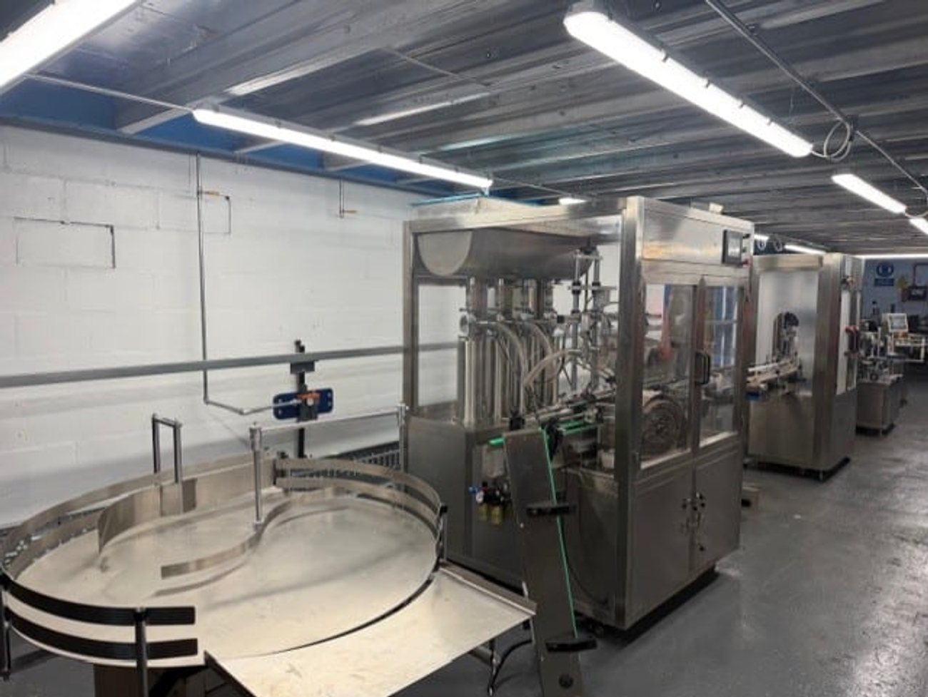 Kwikfill automated filling machine ready for installation at Midland Oil Group warehouse Halesowen