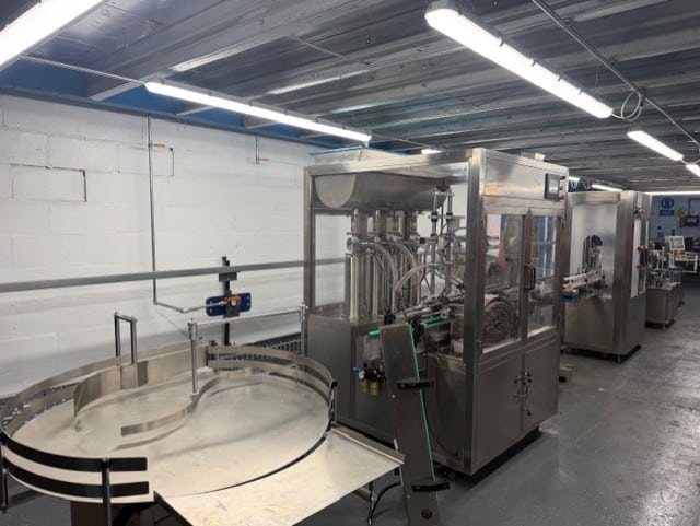 Kwikfill automated filling machine ready for installation at Midland Oil Group warehouse Halesowen