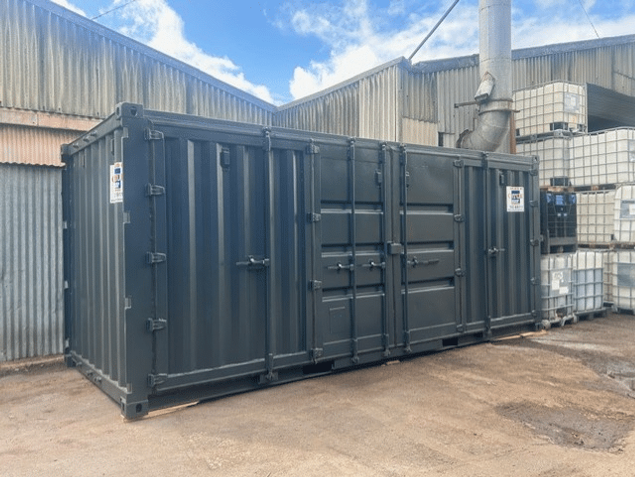 Hazardous chemicals container delivery and installation at Midland Oil Group manufacturing site