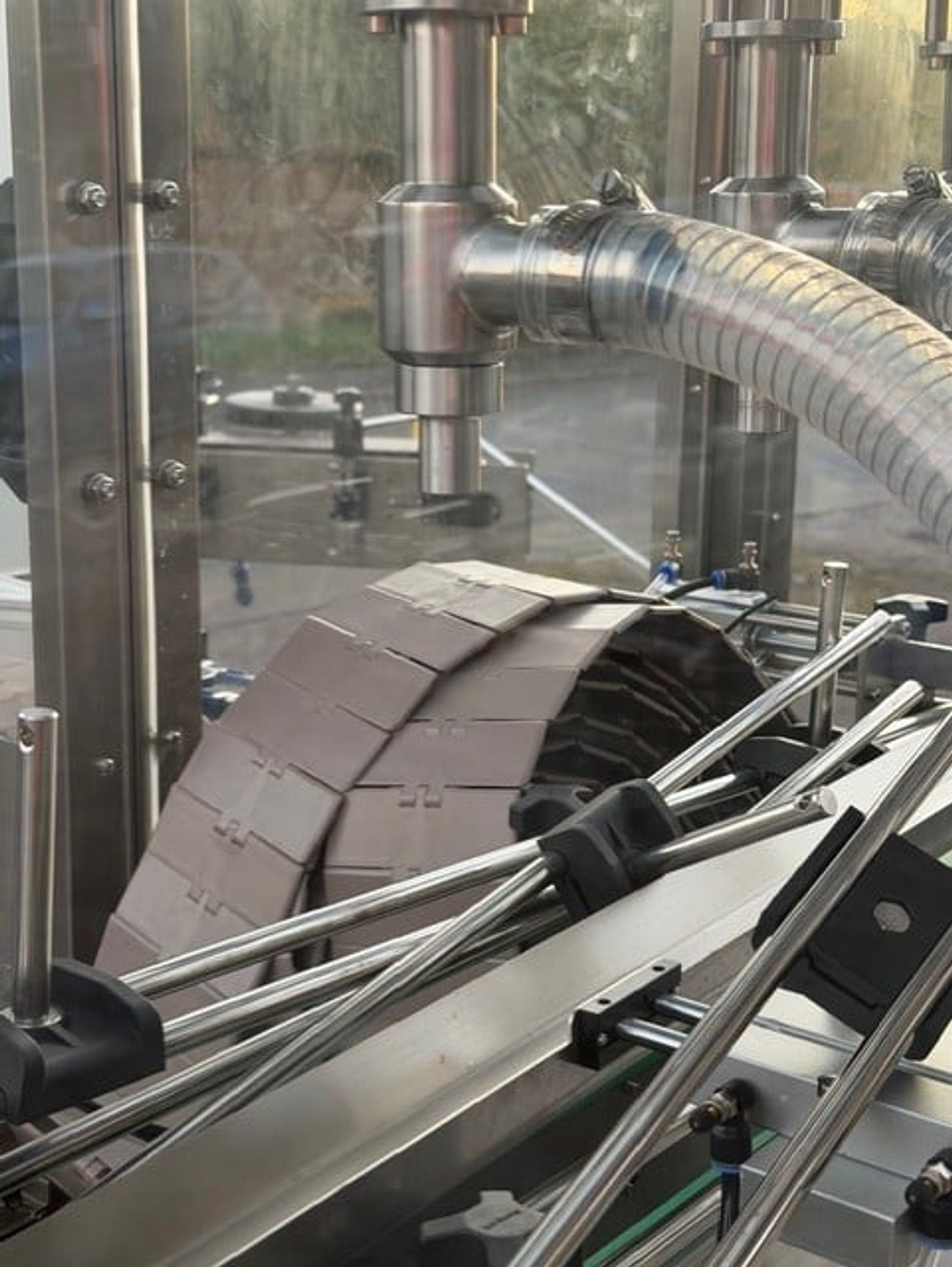 Industrial automated filling equipment for Kwikfill small pack operation at Midland Oil Group"