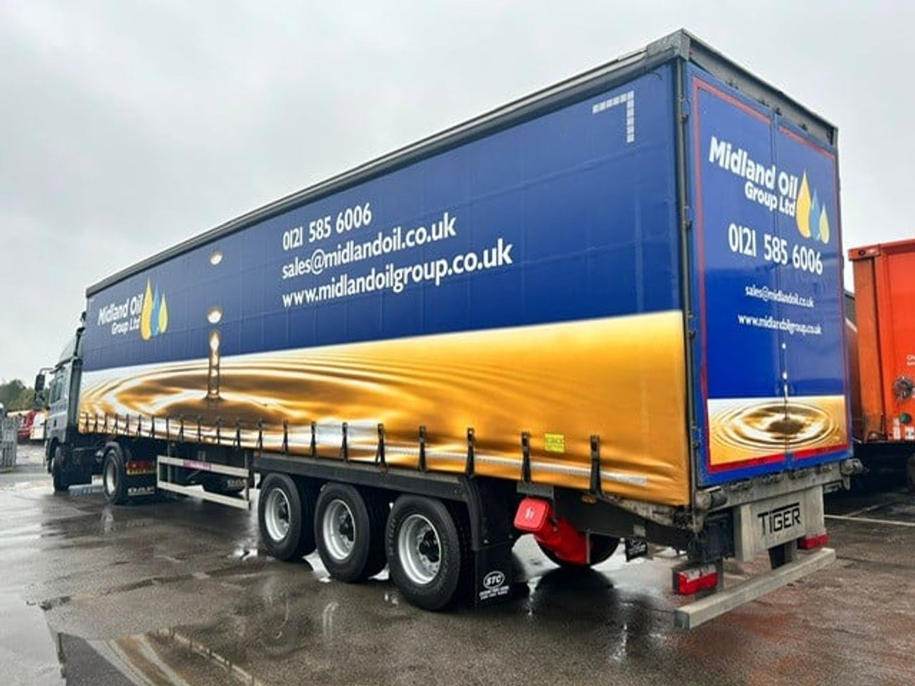 Side shot of Midland Oil Group truck