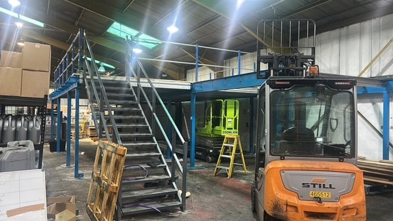 Forklift installation of chemical storage container at Midland Oil Group West Midlands facility