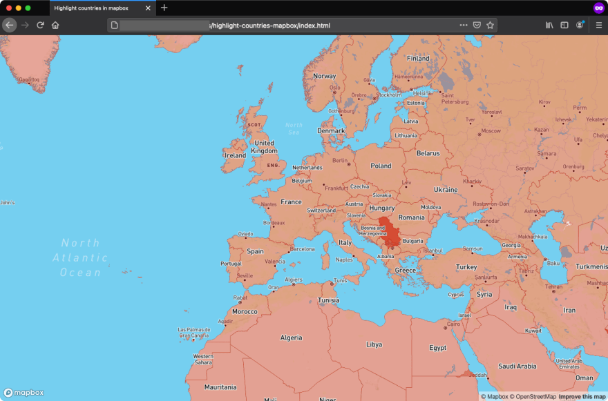 A browser window showing a full-size Mapbox map highlighting all countries in red with a 60% opacity.