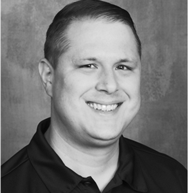 a headshot of Eric Hubbard