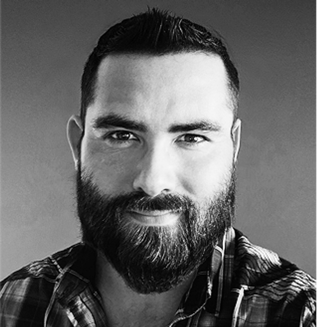 a headshot of Dominick Pelosi