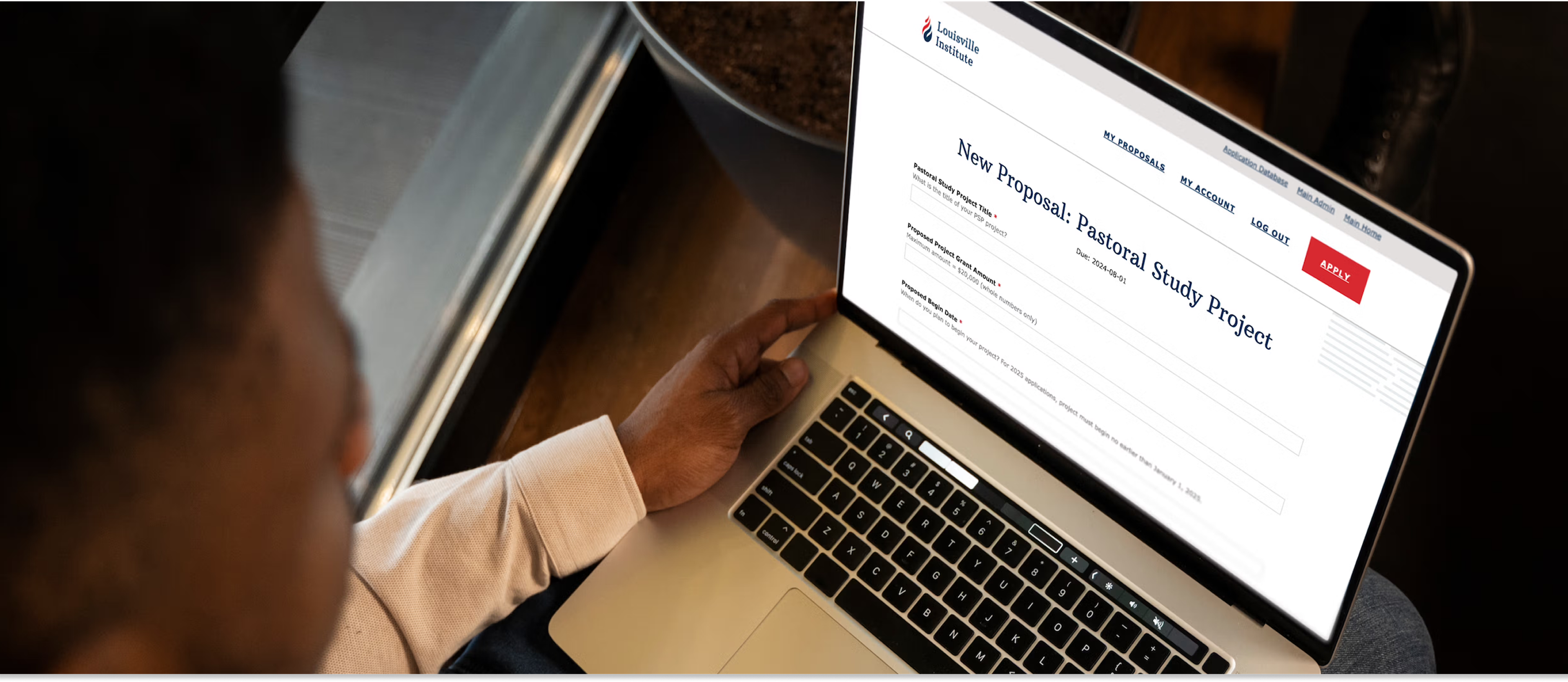 photo of laptop with "New Proposal: Pastoral Study Project" title on screen