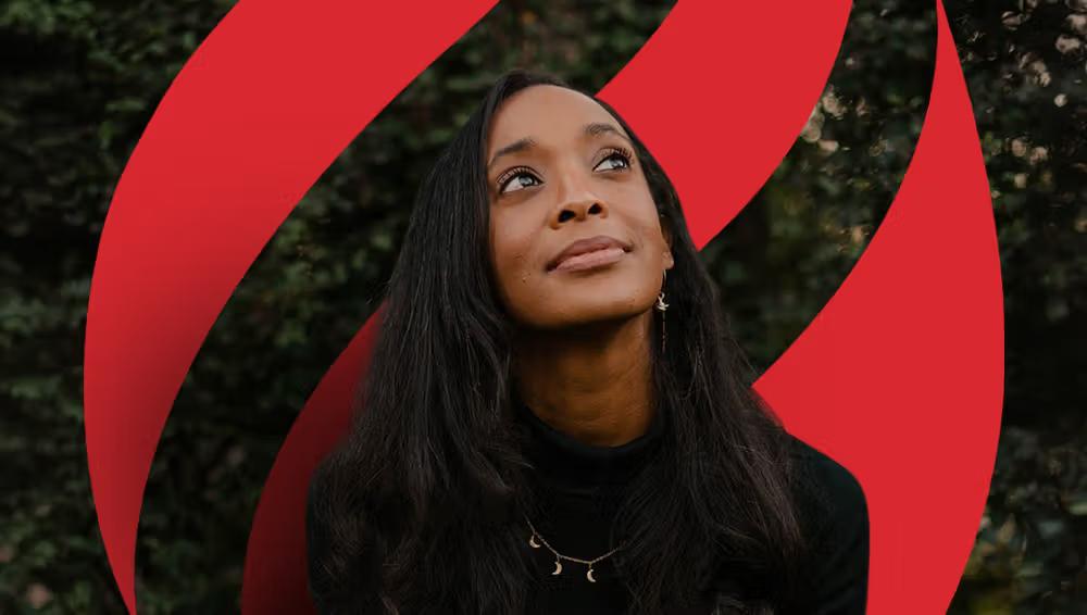 a mountain with a mix of rock and snow surrounding it