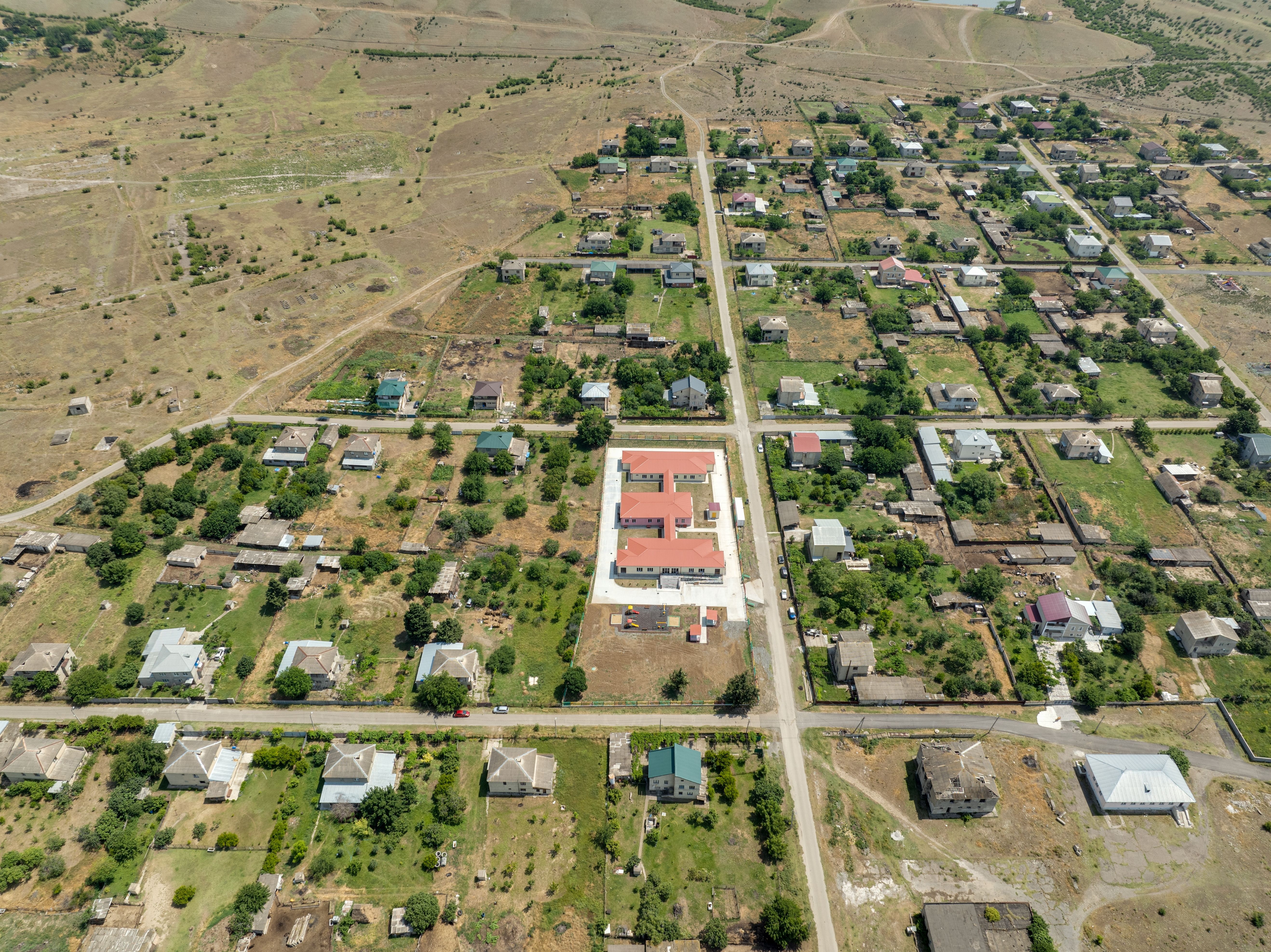 Aerial view of a preschool building within a residential neighbourhood.