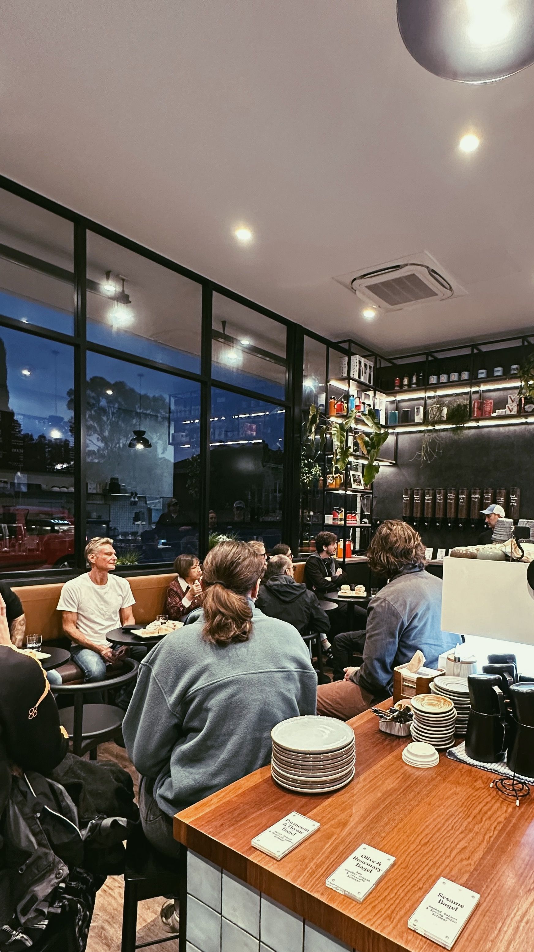 A crowd of people are seated listening to the speakers at our Bicton cupping event.