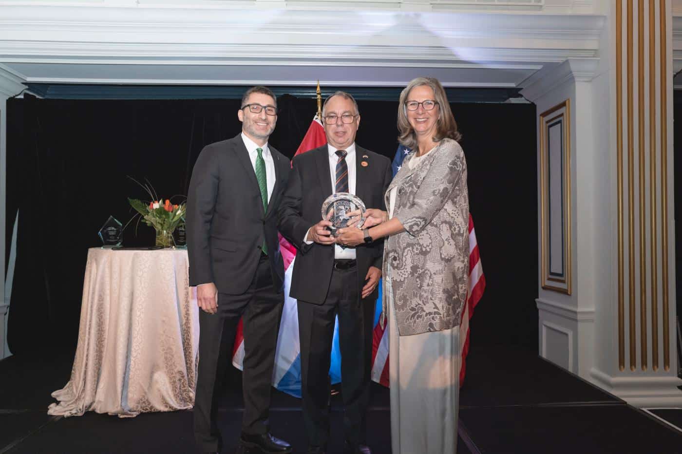 People gathered at an allied-space partnership award event.