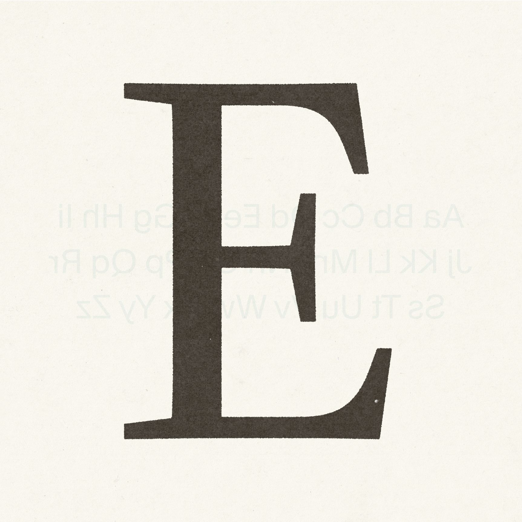 Crop closeup of a letter 'E' on paper
