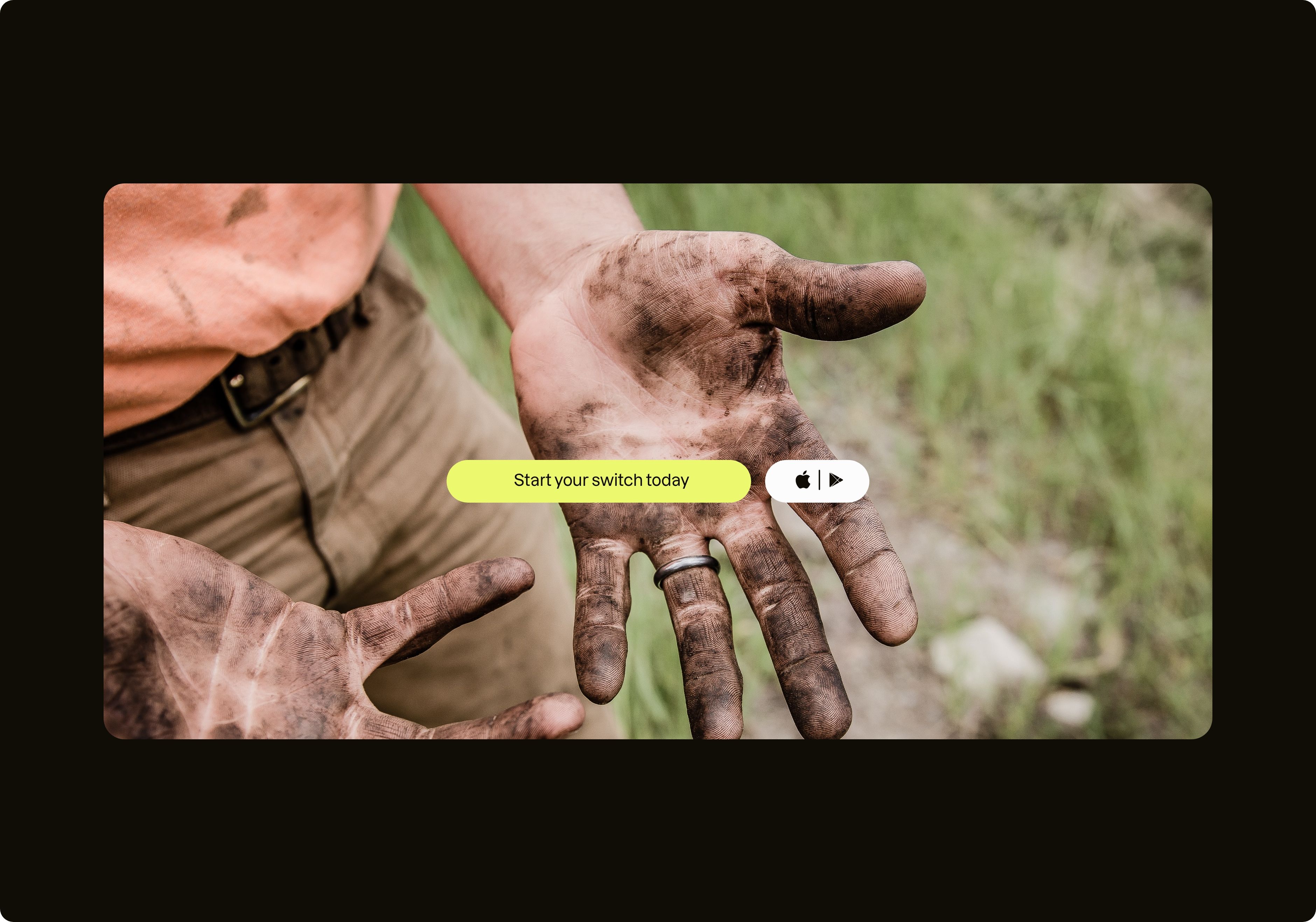 Photograph of farmer showing muddy hands.