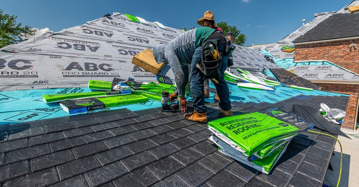 Pose d'une membrane d'étanchéité sur toiture-terrasse
