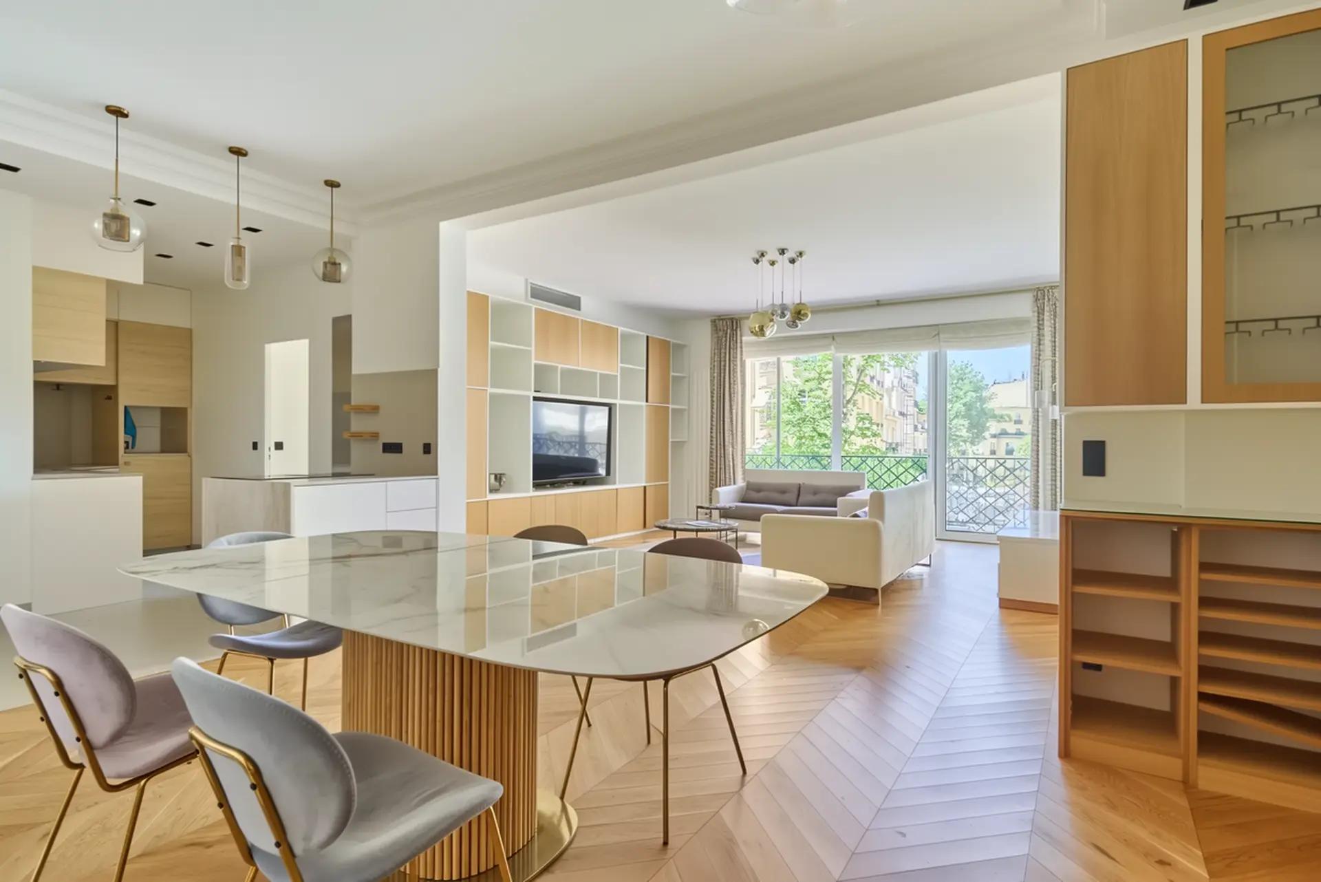 Bright fully furnished Paris apartment with elegant interiors, spacious living areas, balcony access, and comfortable amenities.