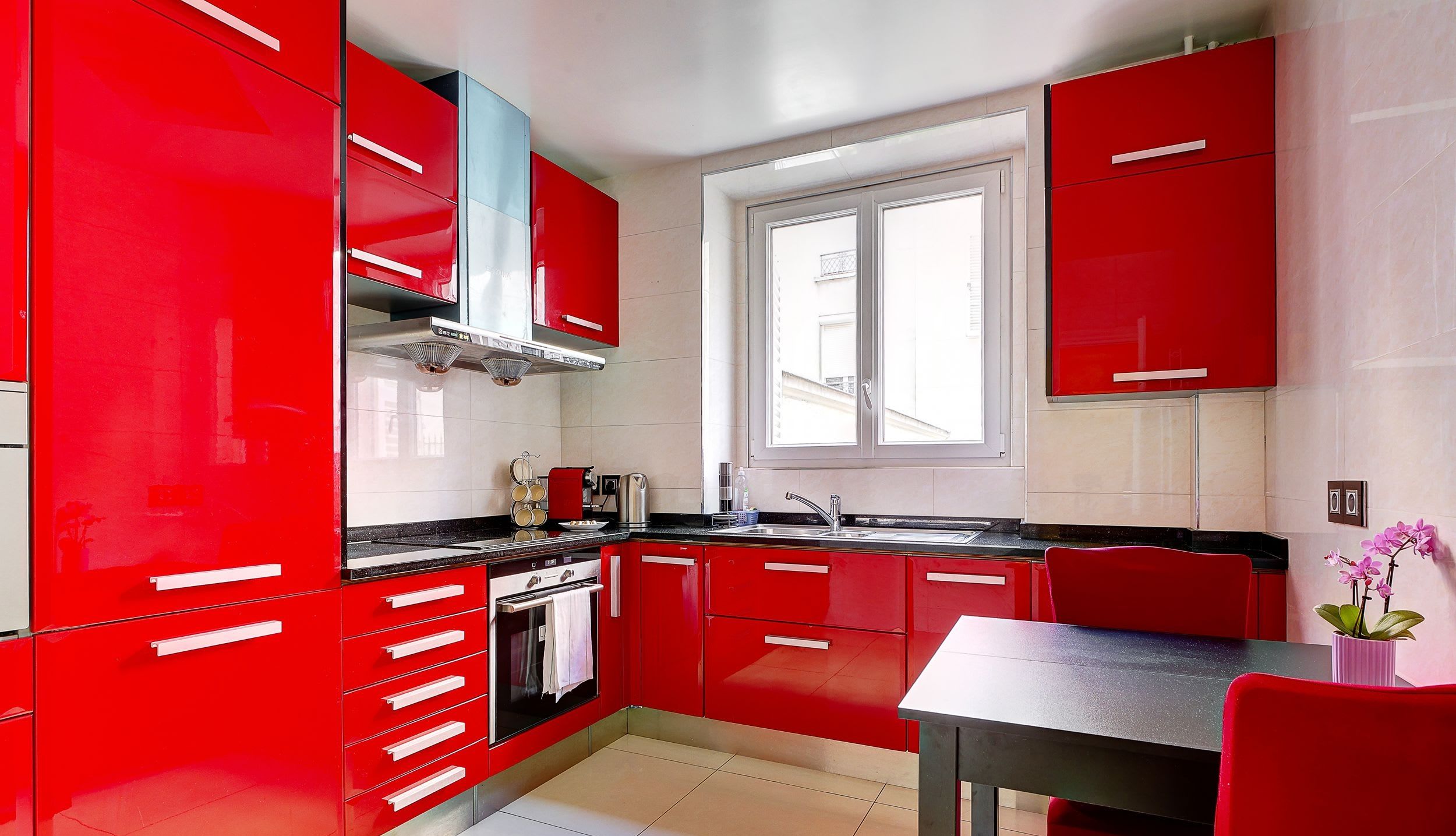 Fully equipped and functional kitchen: Dining area, storage cabinets, oven, sink, stovetop, and more.