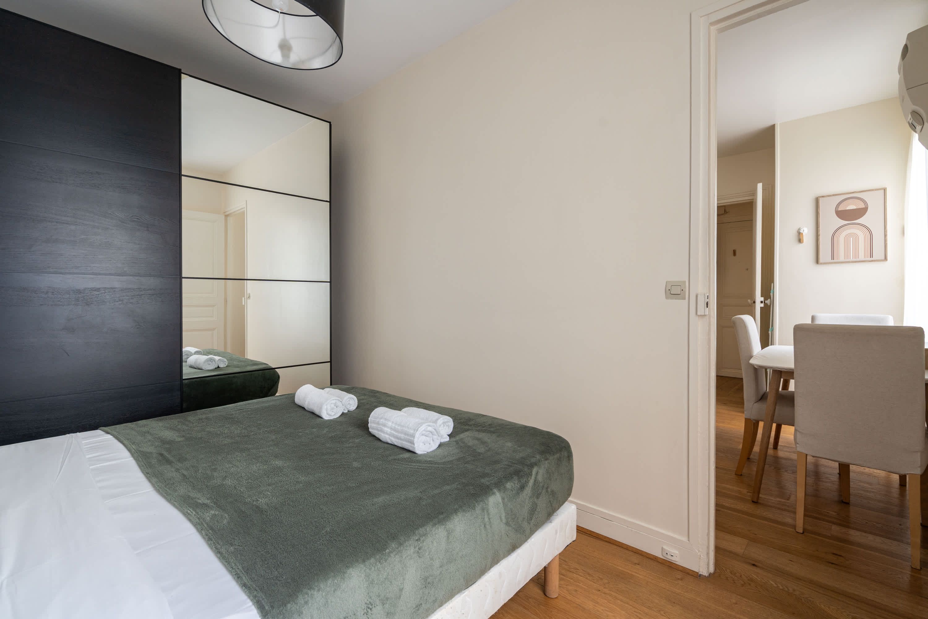 Elegant Parisian apartments with bright living areas, cozy bedrooms, and fully equipped kitchens.