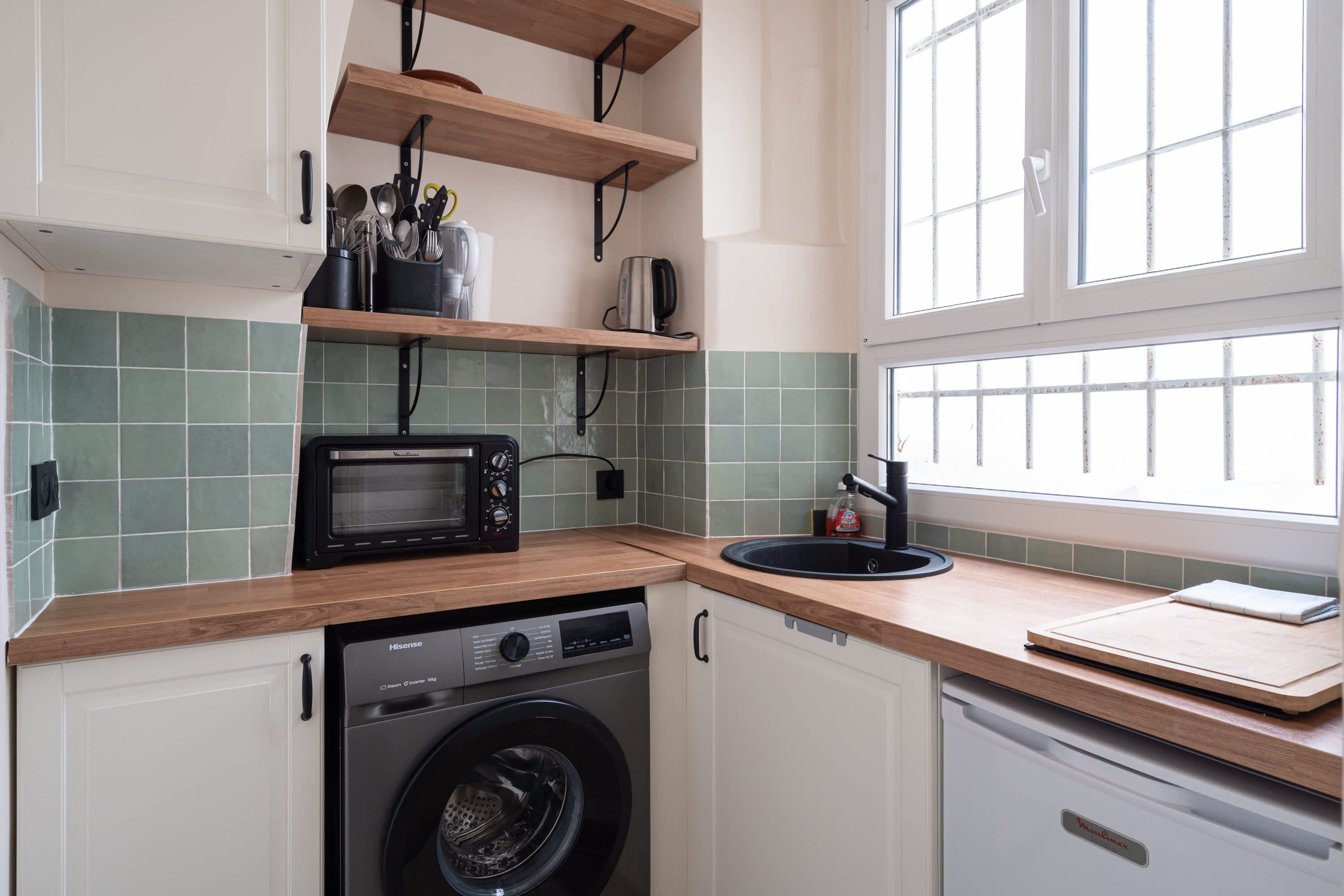 Elegant Parisian apartments with bright living areas, cozy bedrooms, and fully equipped kitchens.