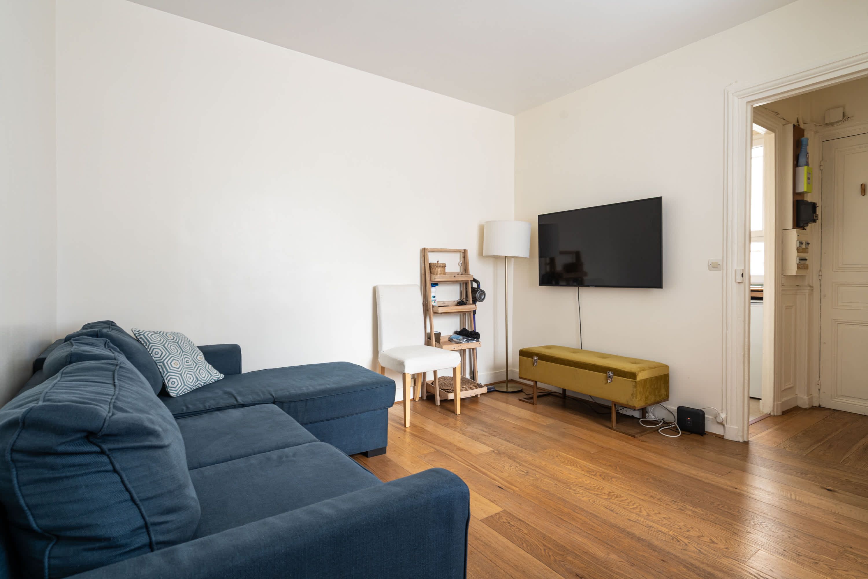 Cozy living space with a convertible sofa and dining area