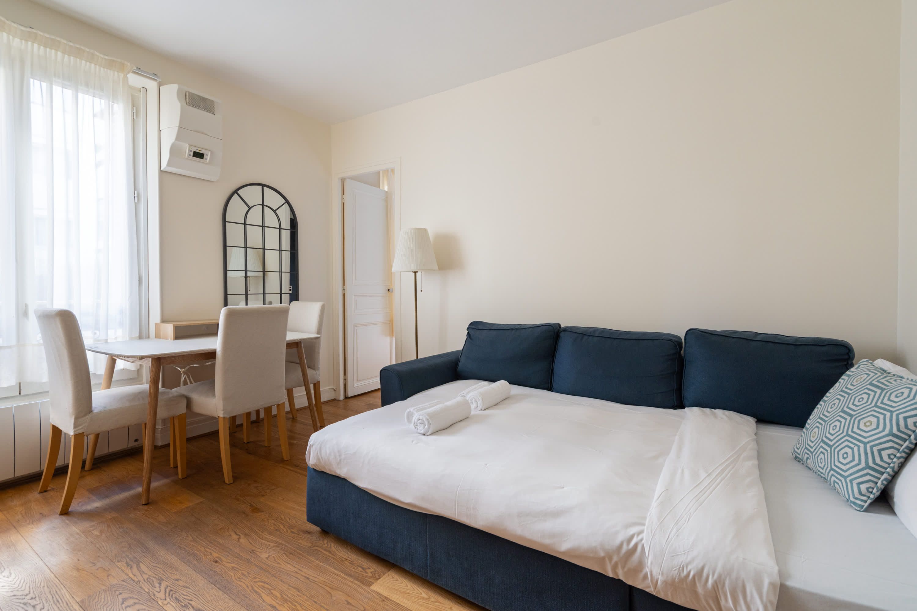 Elegant Parisian apartments with bright living areas, cozy bedrooms, and fully equipped kitchens.