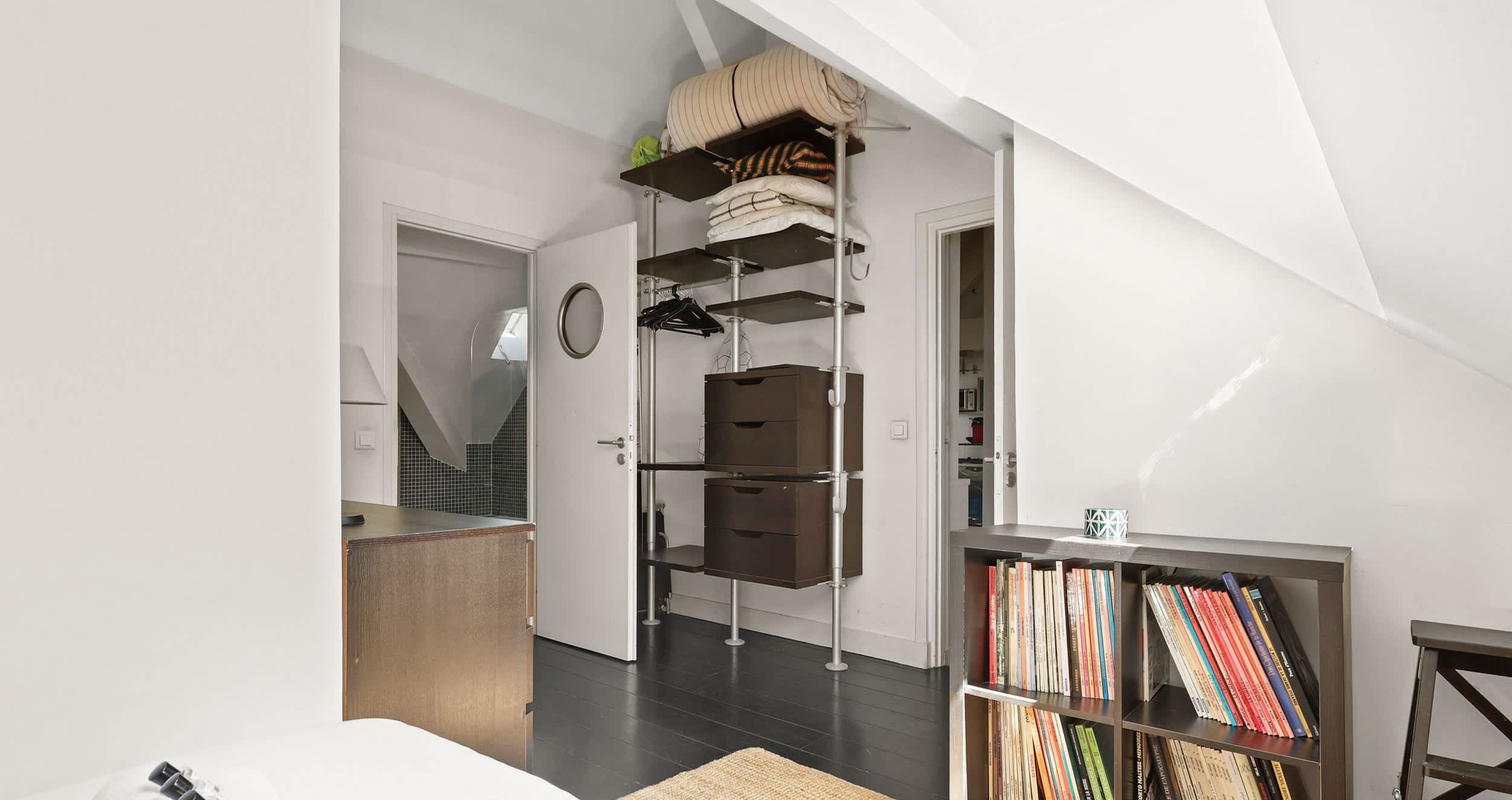 Charming furnished one-bedroom apartment rue Daguerre Paris 14th, bright top-floor living room with skylight windows and open kitchen