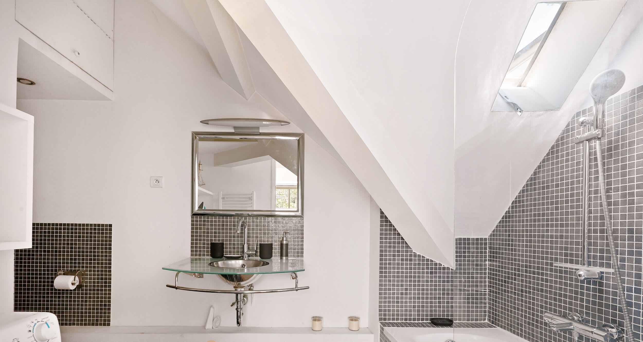 Charming furnished one-bedroom apartment rue Daguerre Paris 14th, bright top-floor living room with skylight windows and open kitchen