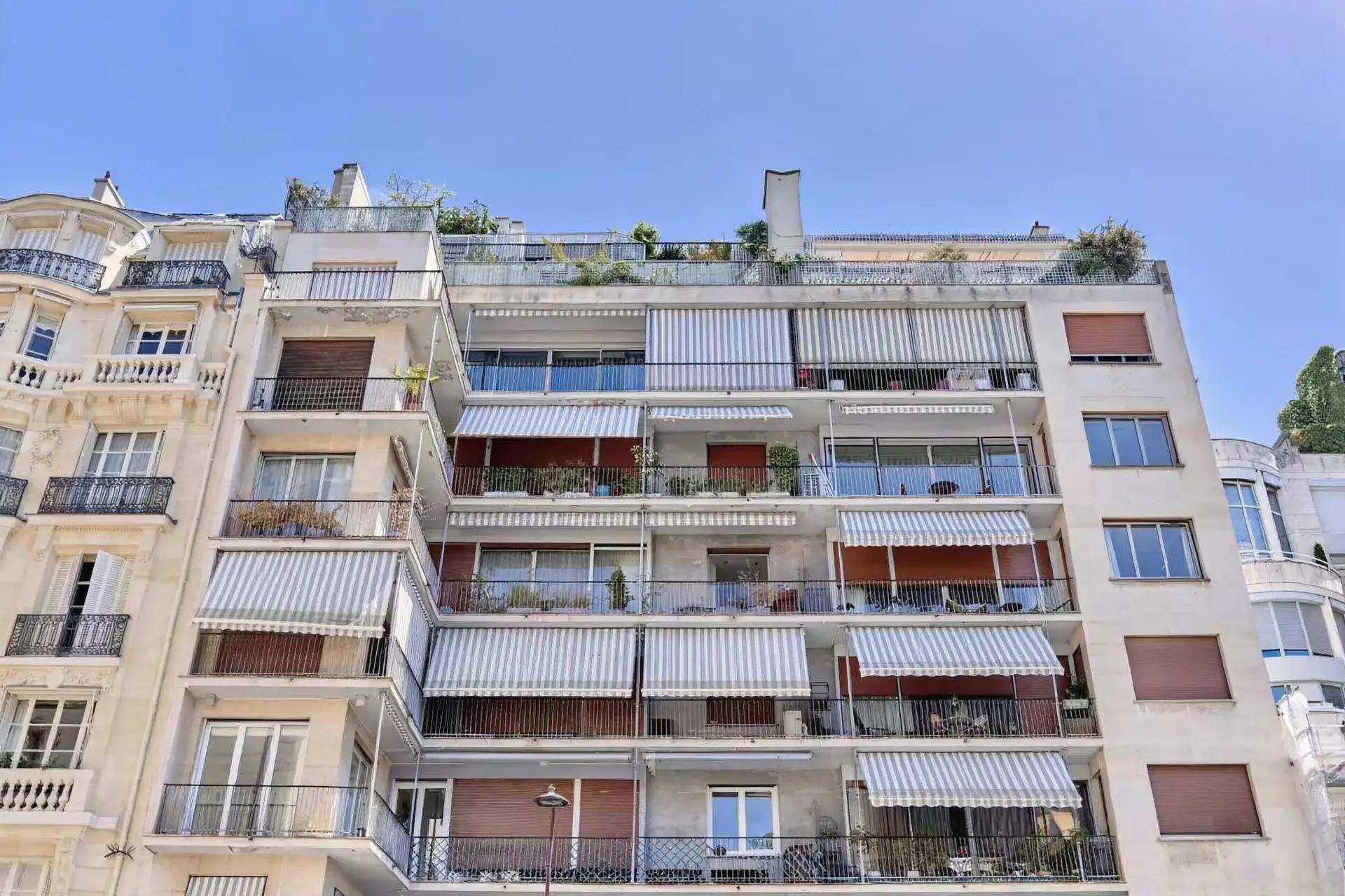 Bright fully furnished Paris apartment with elegant interiors, spacious living areas, balcony access, and comfortable amenities.