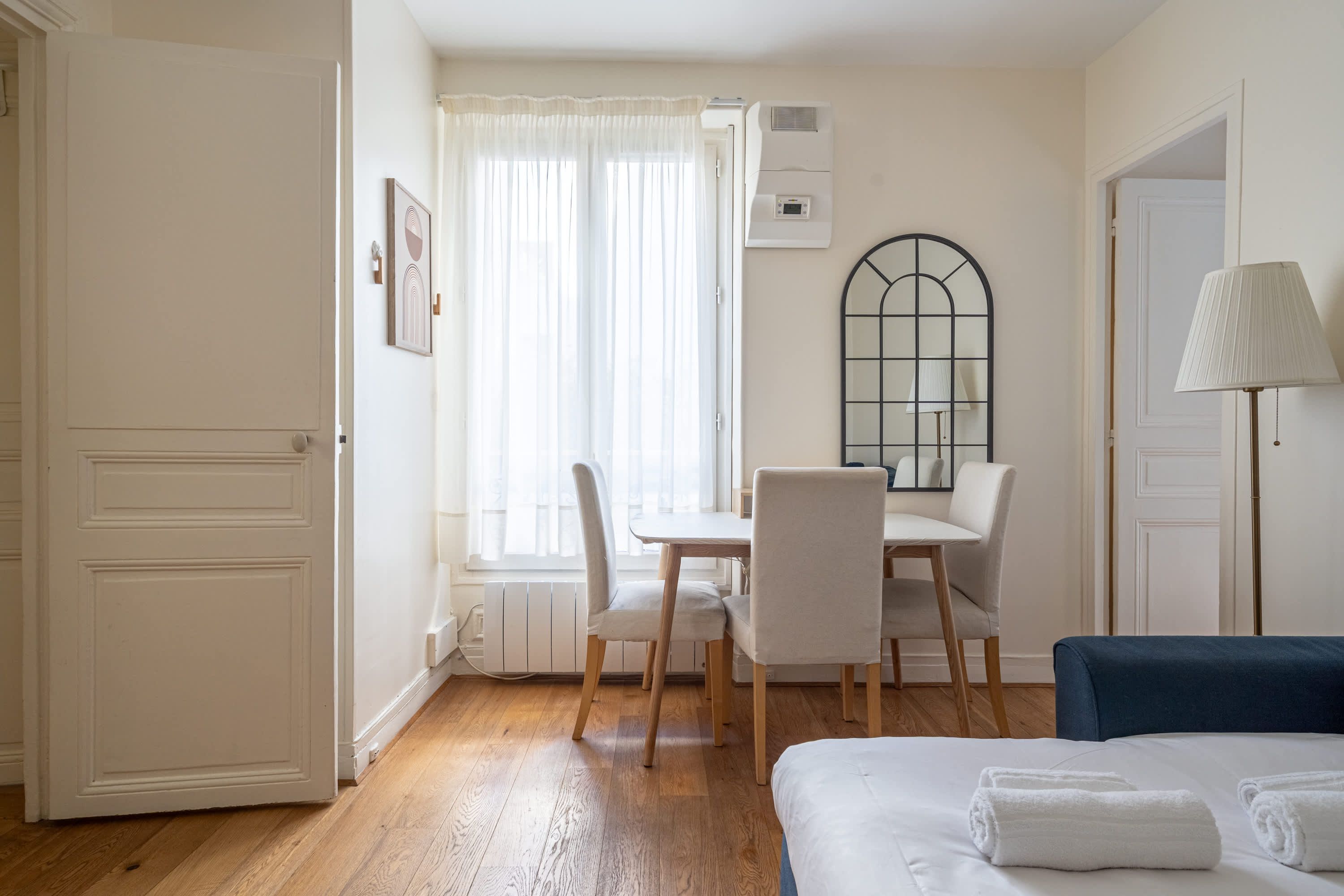 Elegant Parisian apartments with bright living areas, cozy bedrooms, and fully equipped kitchens.