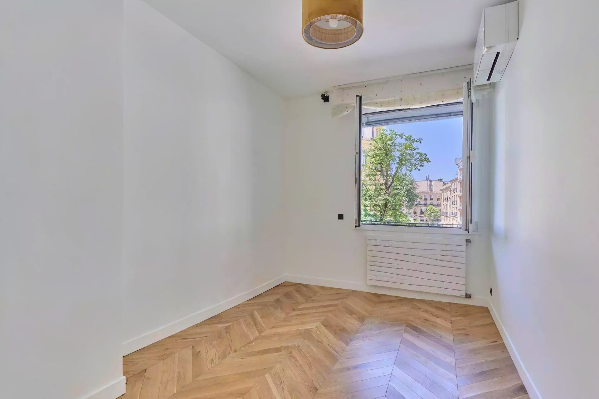 Bright fully furnished Paris apartment with elegant interiors, spacious living areas, balcony access, and comfortable amenities.