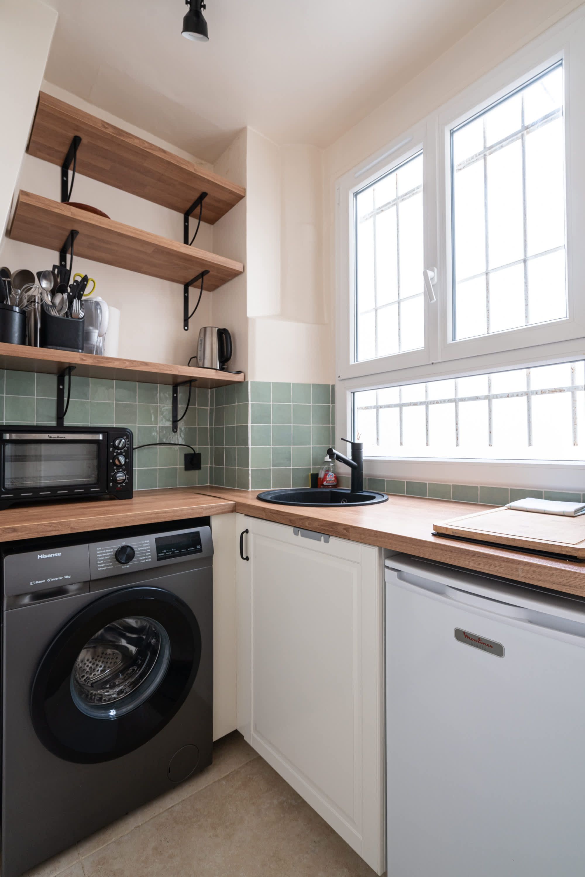 Elegant Parisian apartments with bright living areas, cozy bedrooms, and fully equipped kitchens.