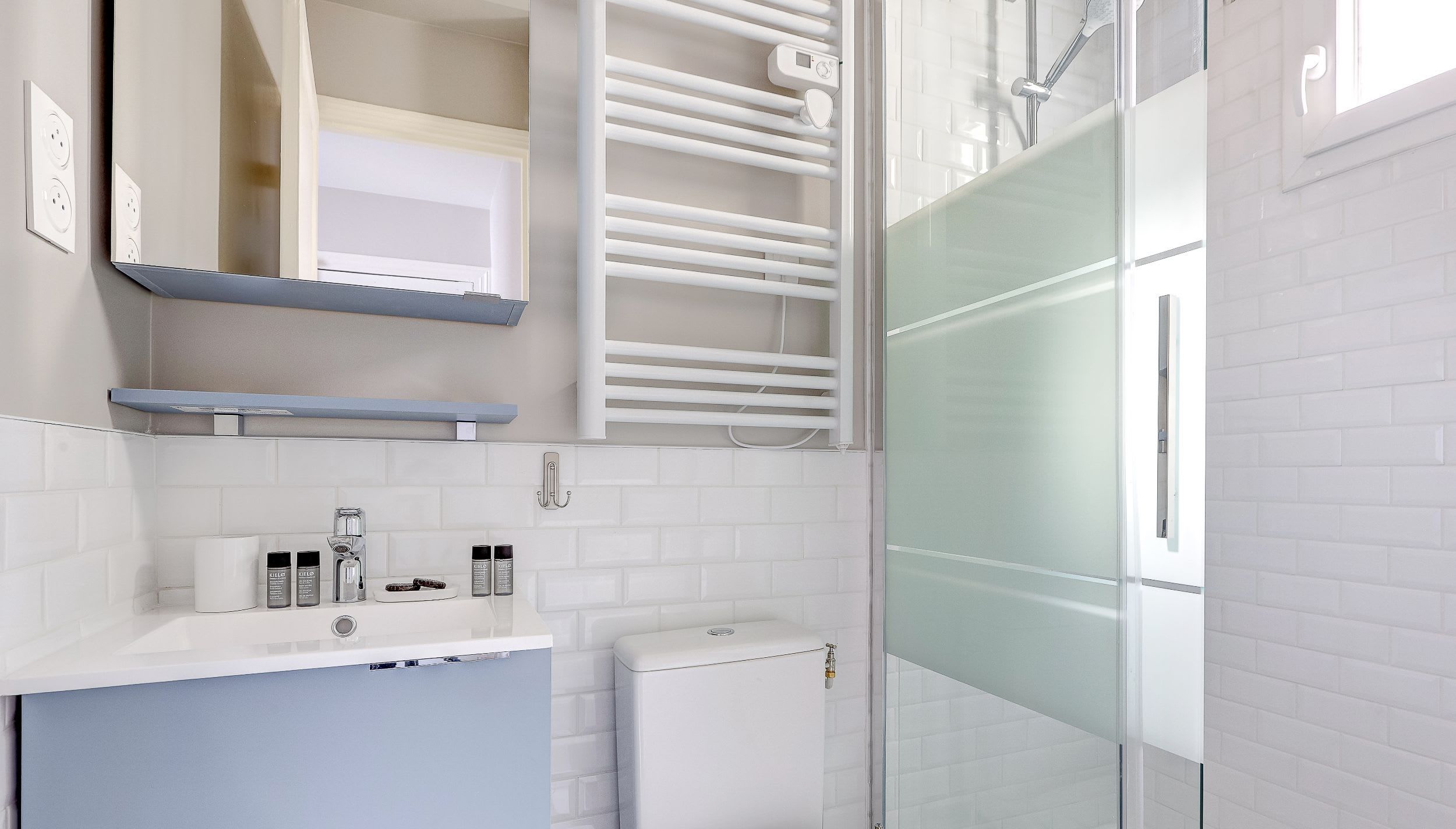 The bathroom is fitted with a shower, toilet, and washbasin, providing everything you need for your daily comfort.