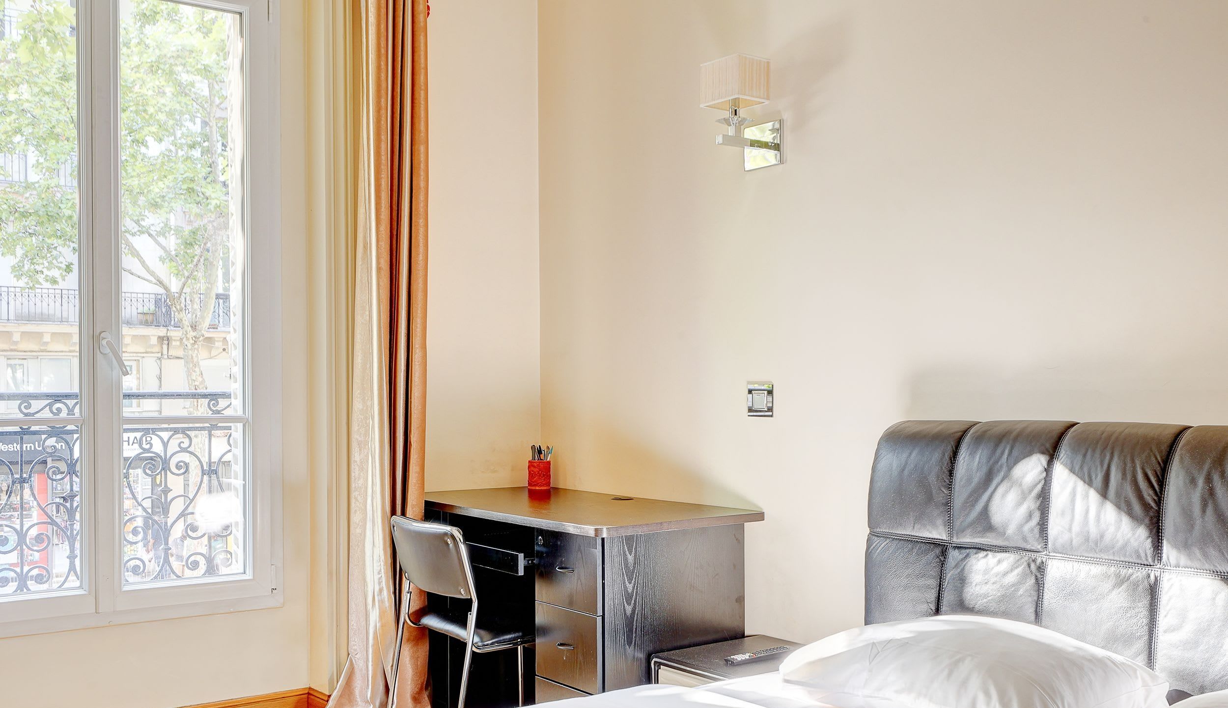 Bedroom 2: Double bed and a desk.