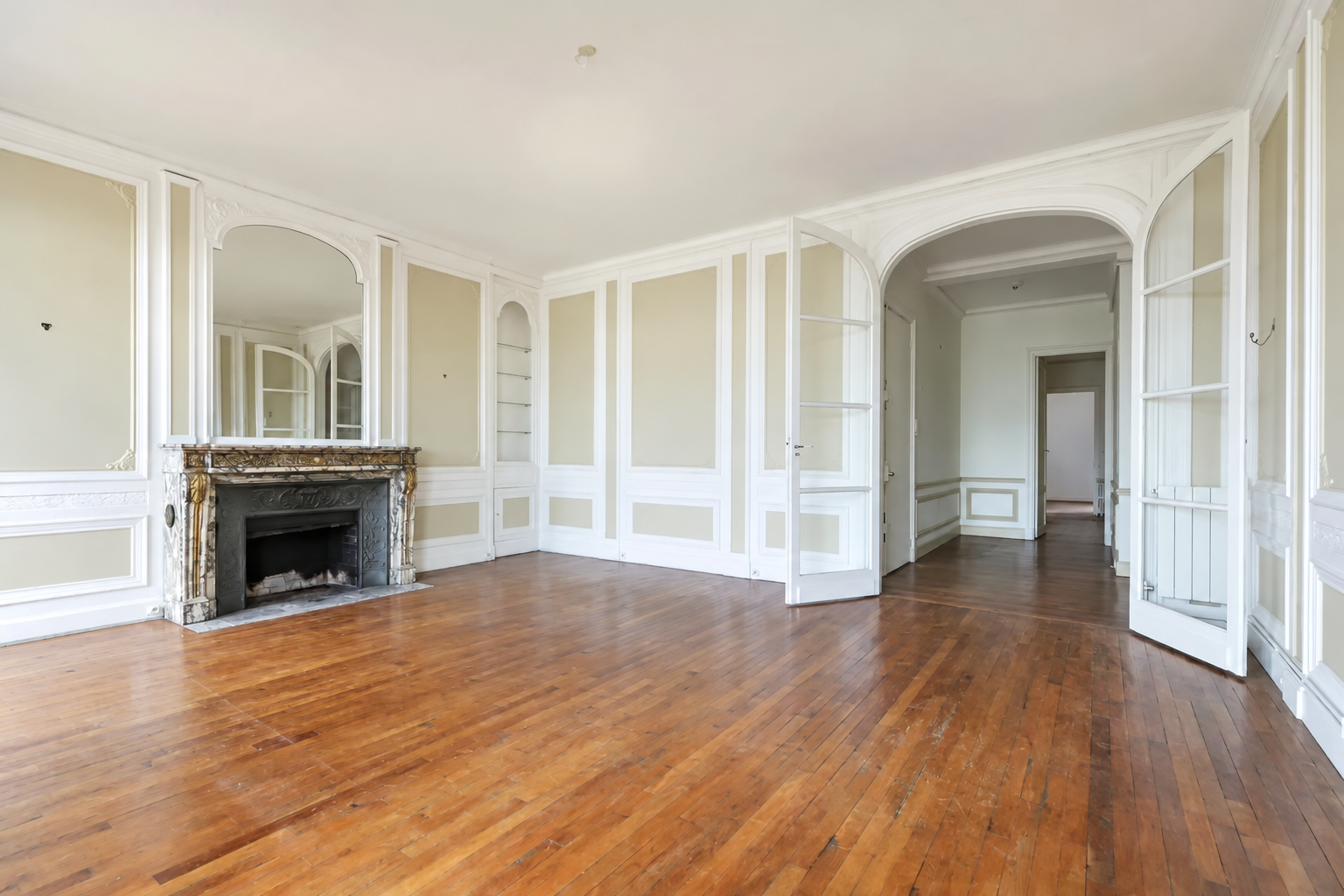 Haussmann-style living room with ornate fireplace
