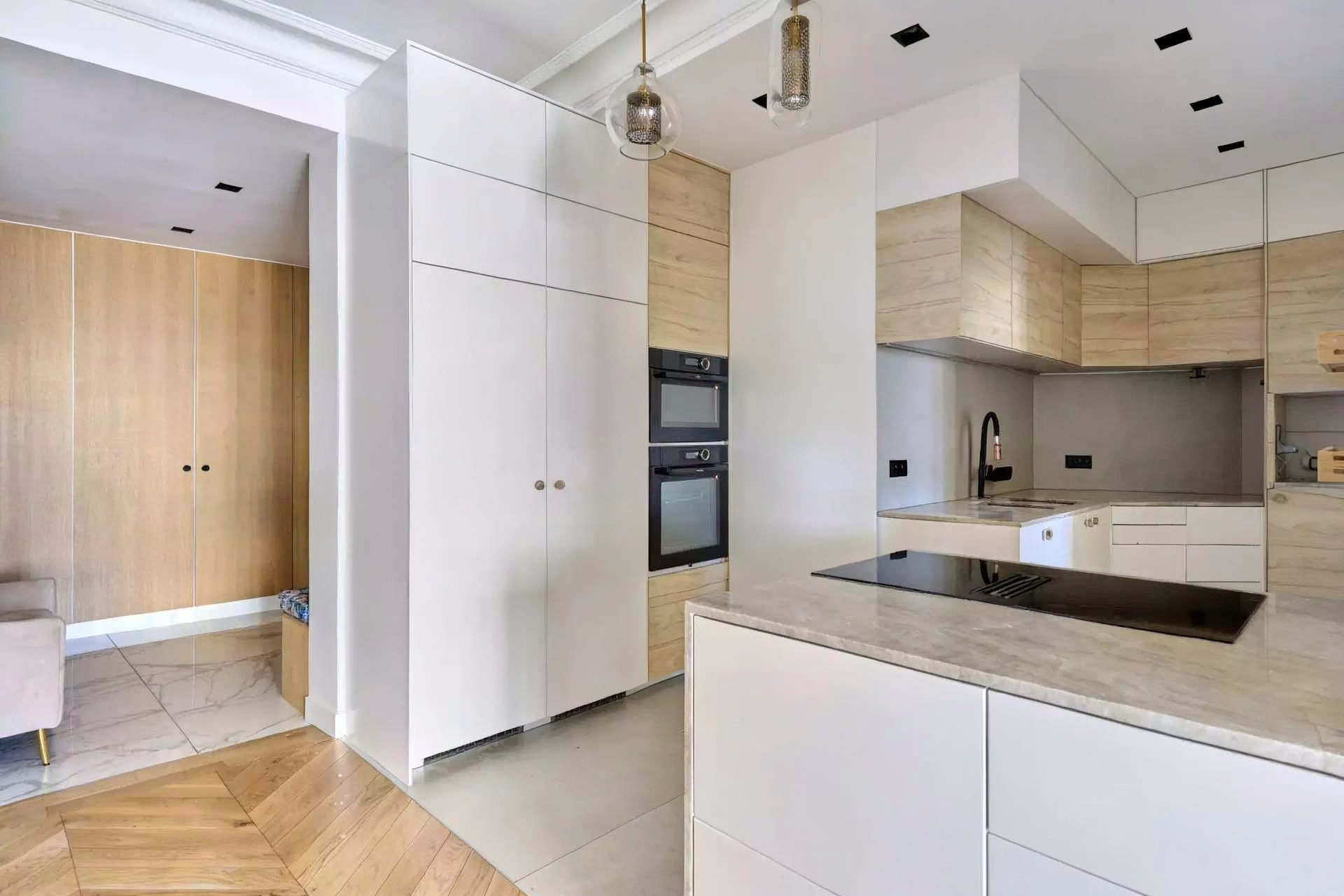 Bright fully furnished Paris apartment with elegant interiors, spacious living areas, balcony access, and comfortable amenities.