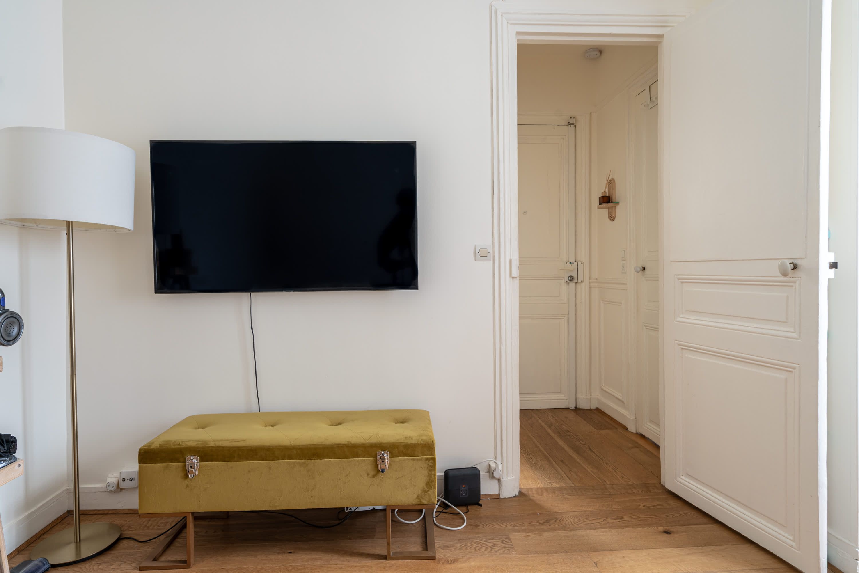 Elegant Parisian apartments with bright living areas, cozy bedrooms, and fully equipped kitchens.