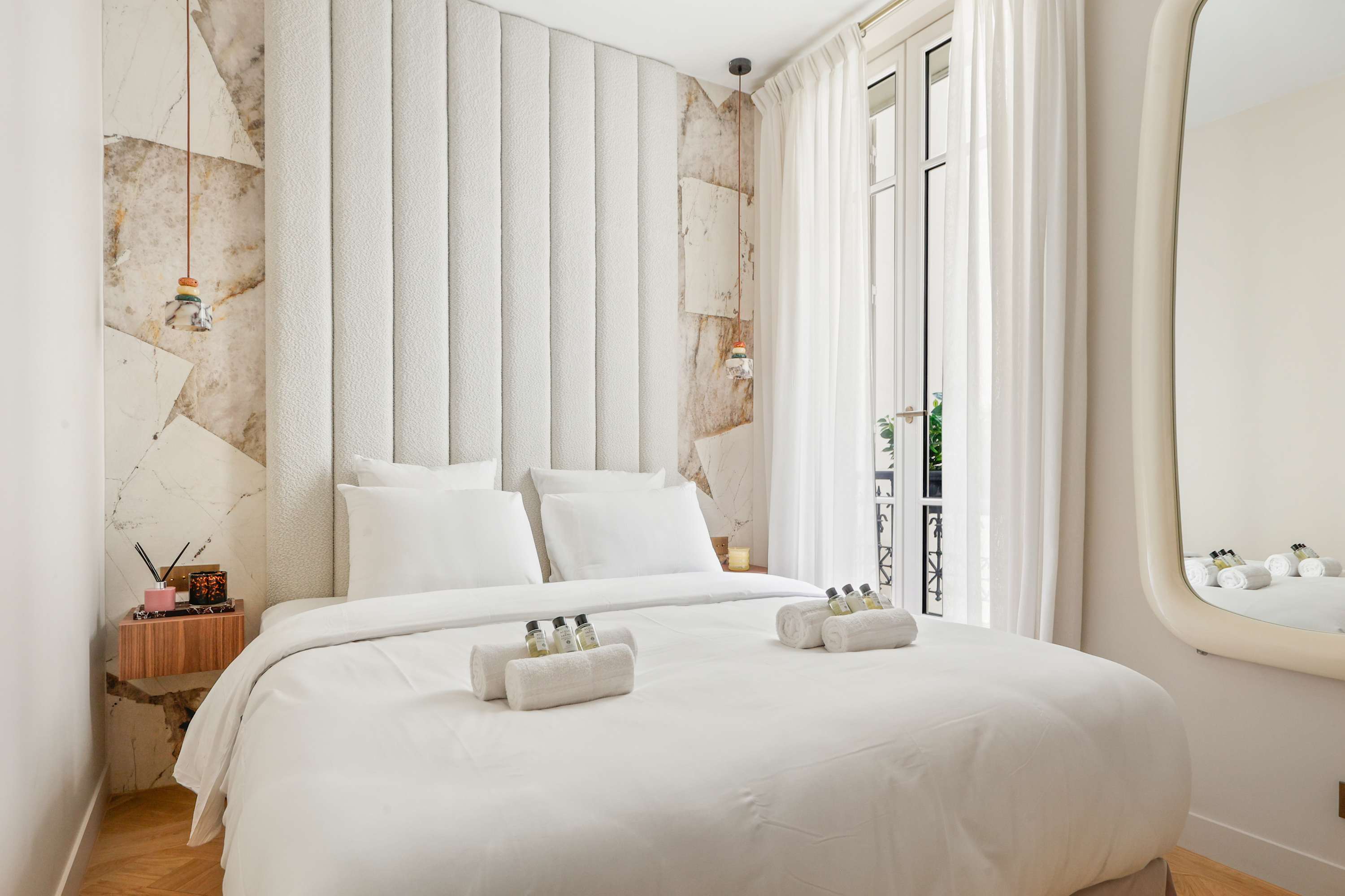 Architect-designed luxury apartment facing Le Bon Marché, Paris 6th, bright living room with Versailles parquet flooring and bespoke joinery