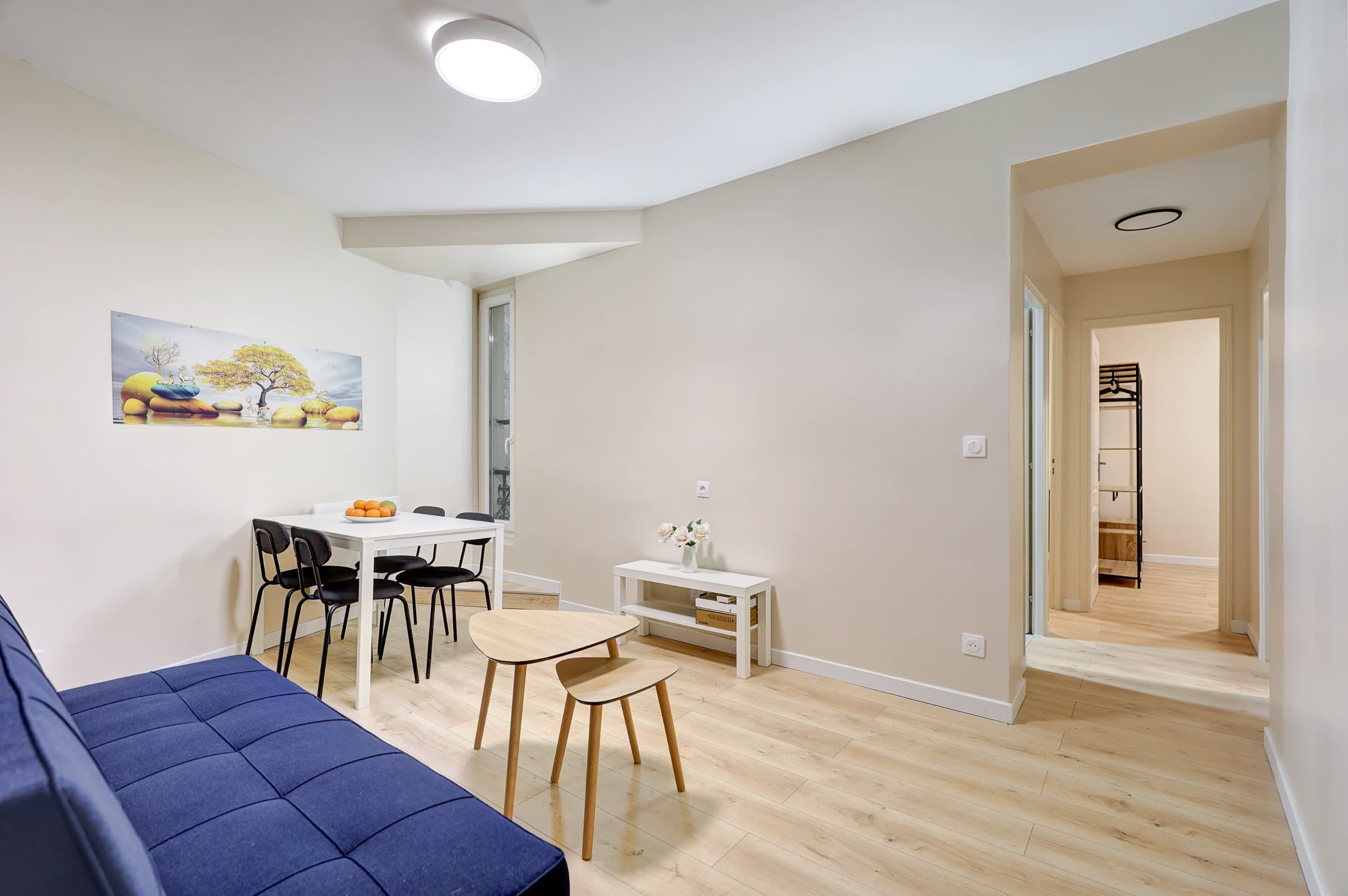 Discover a modern, minimalist living room, where clean lines and elegant design create the perfect space to relax.