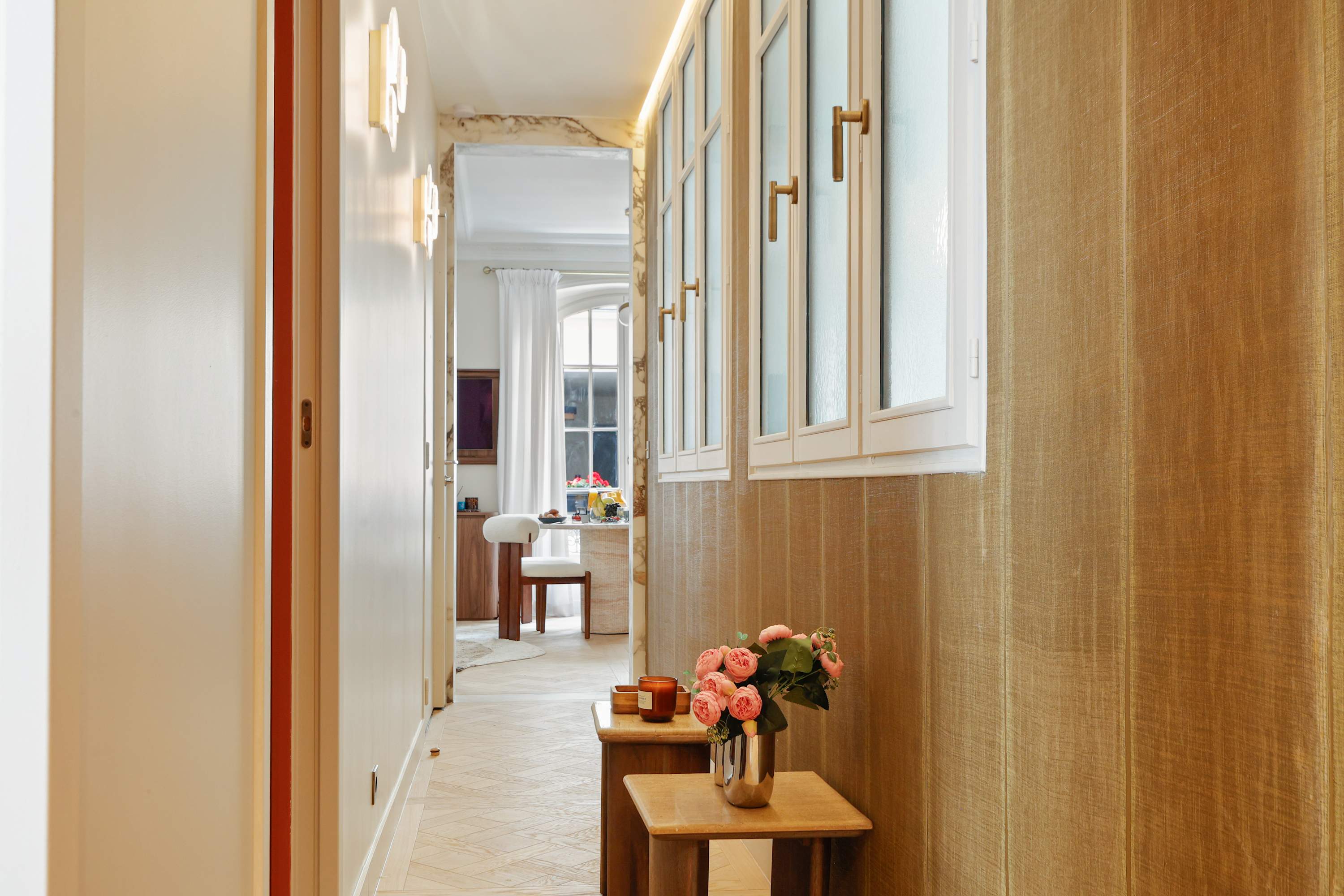 Architect-designed luxury apartment facing Le Bon Marché, Paris 6th, bright living room with Versailles parquet flooring and bespoke joinery