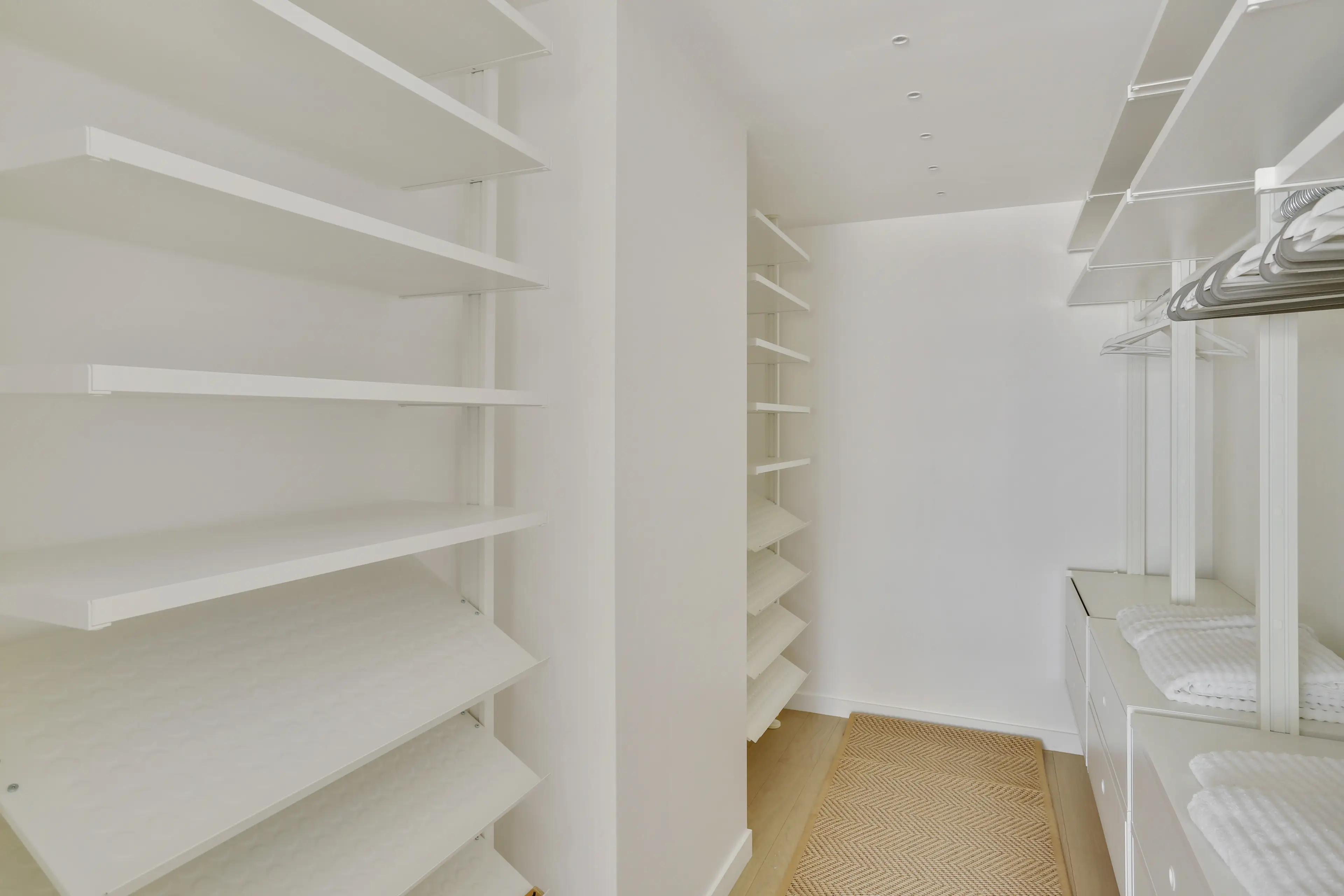Renovated 4-bedroom duplex apartment for rent in Paris 7th arrondissement, bright living room with wraparound balcony and Paris rooftop view