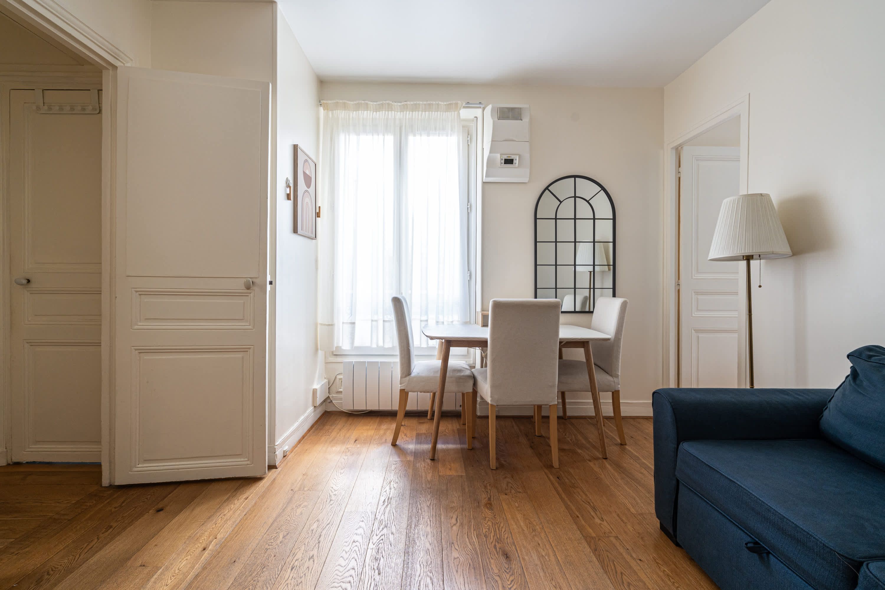 Elegant Parisian apartments with bright living areas, cozy bedrooms, and fully equipped kitchens.