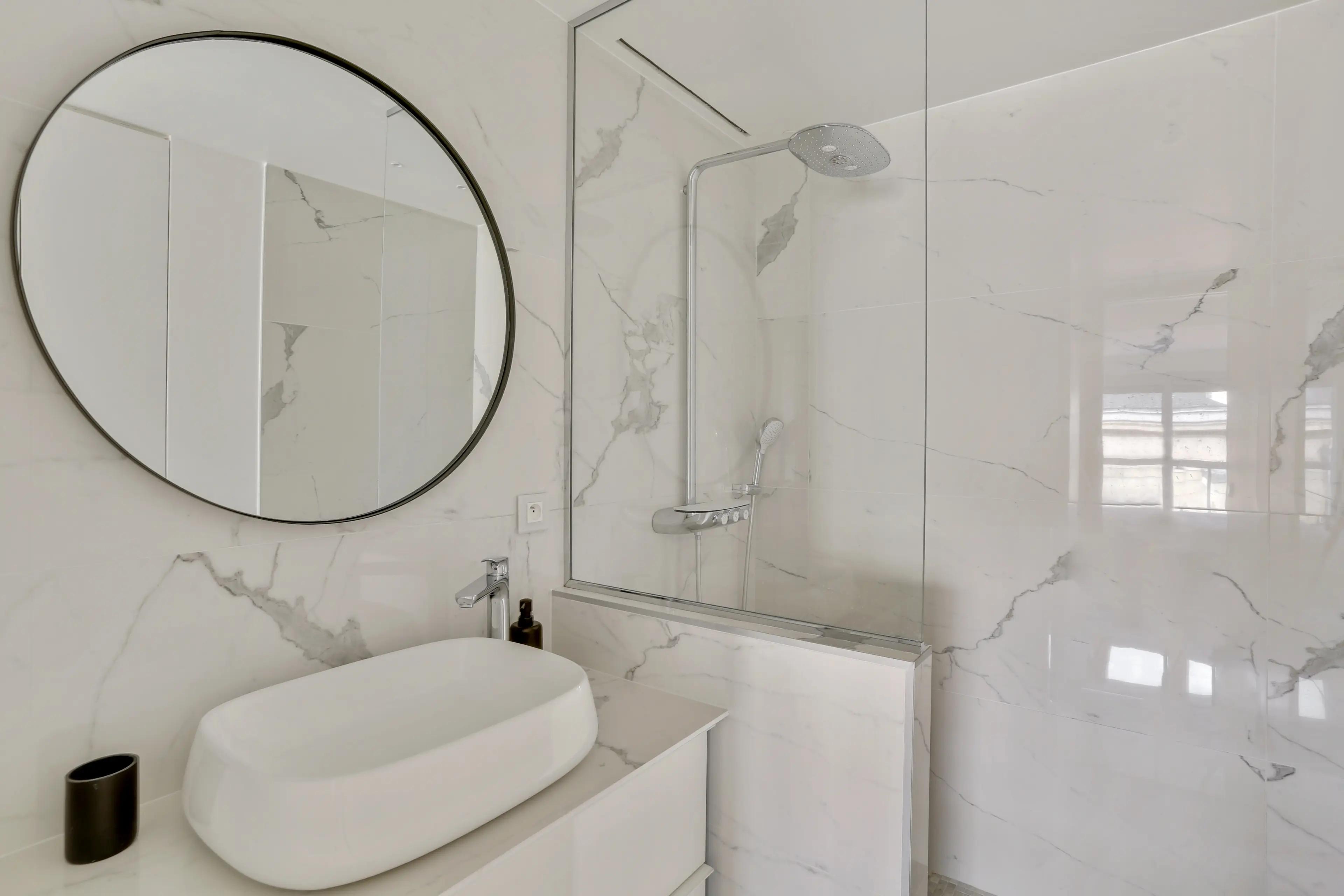 Renovated 4-bedroom duplex apartment for rent in Paris 7th arrondissement, bright living room with wraparound balcony and Paris rooftop view