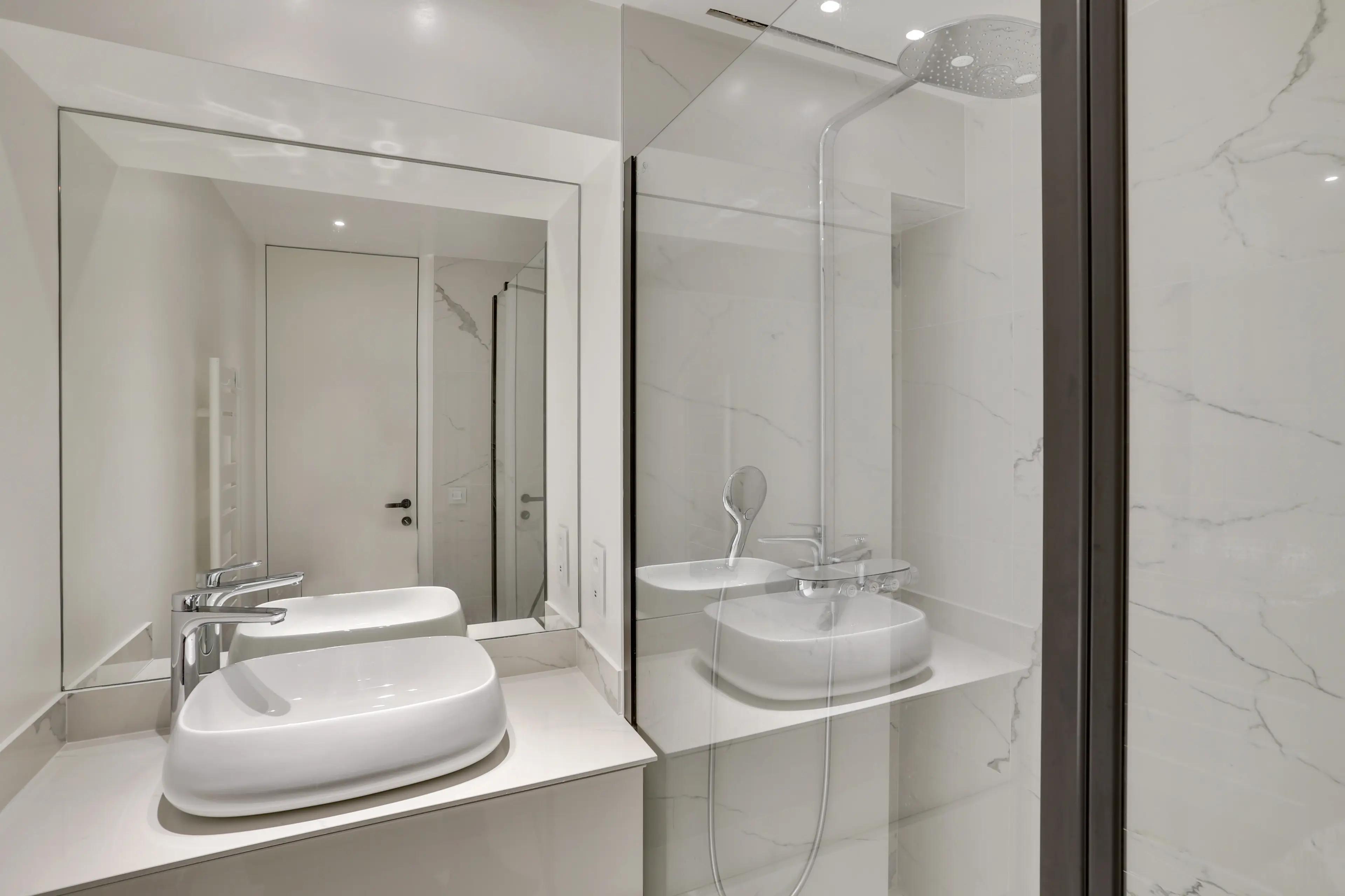 Renovated 4-bedroom duplex apartment for rent in Paris 7th arrondissement, bright living room with wraparound balcony and Paris rooftop view