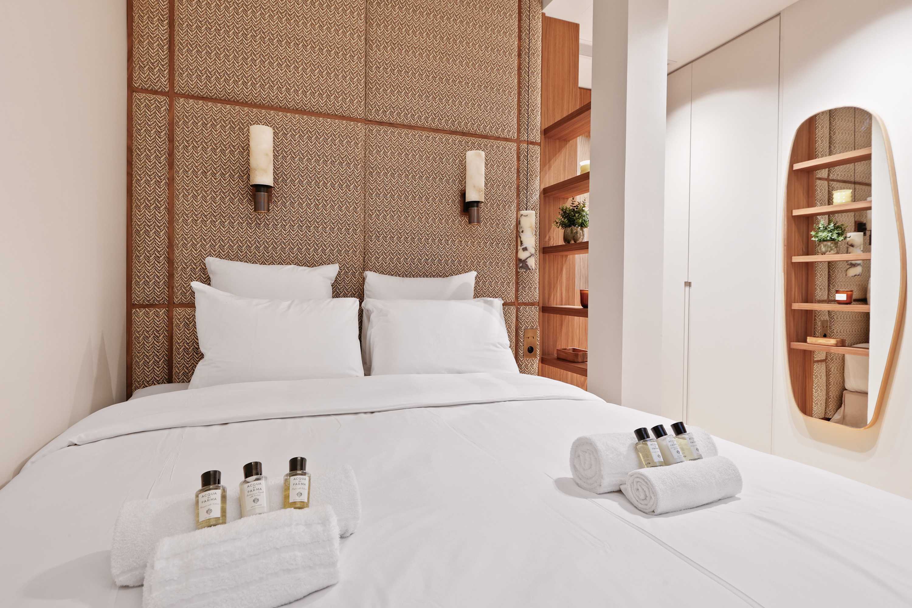 Architect-designed luxury apartment facing Le Bon Marché, Paris 6th, bright living room with Versailles parquet flooring and bespoke joinery