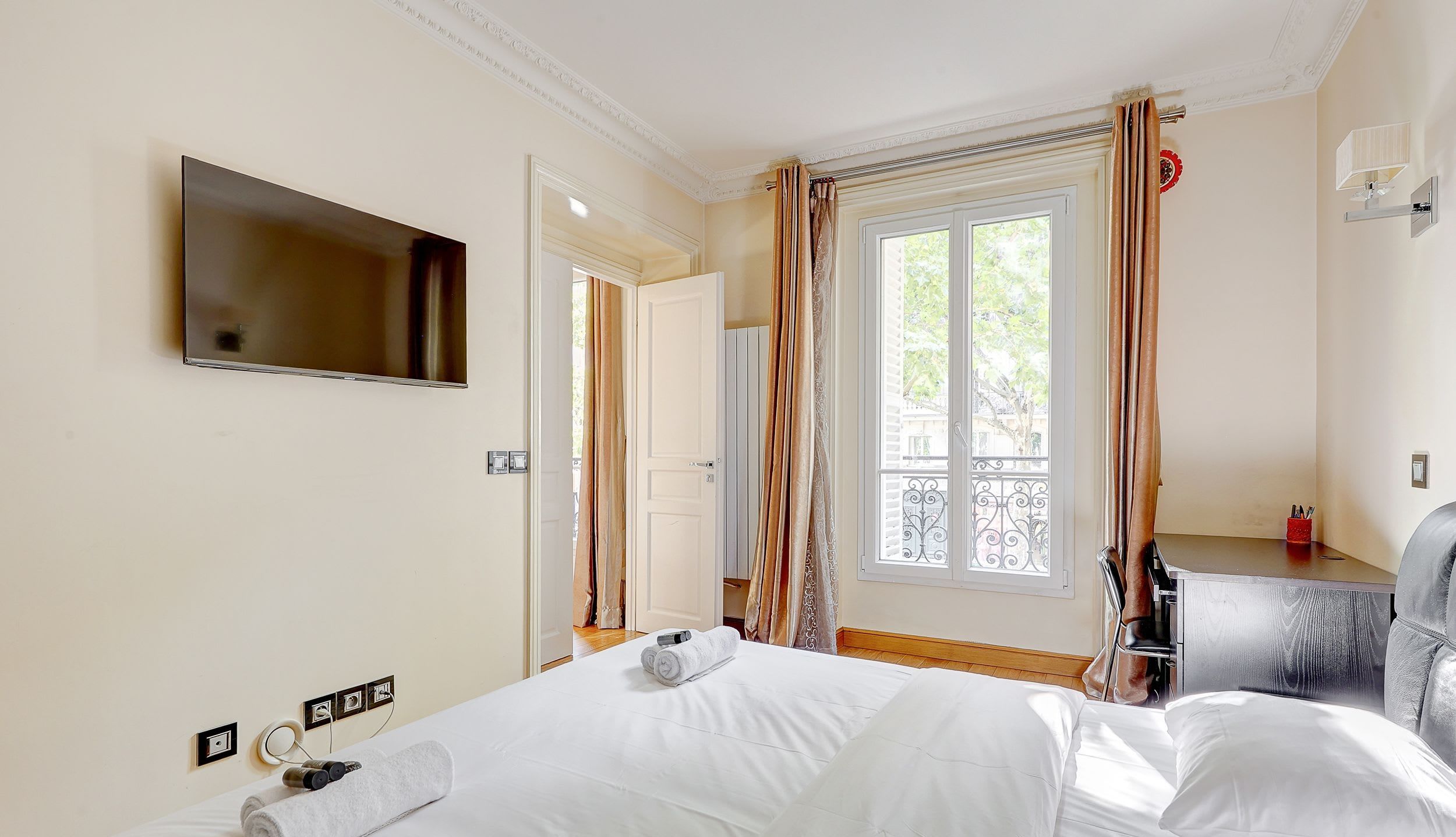 Bedroom 2: Double bed and a desk.