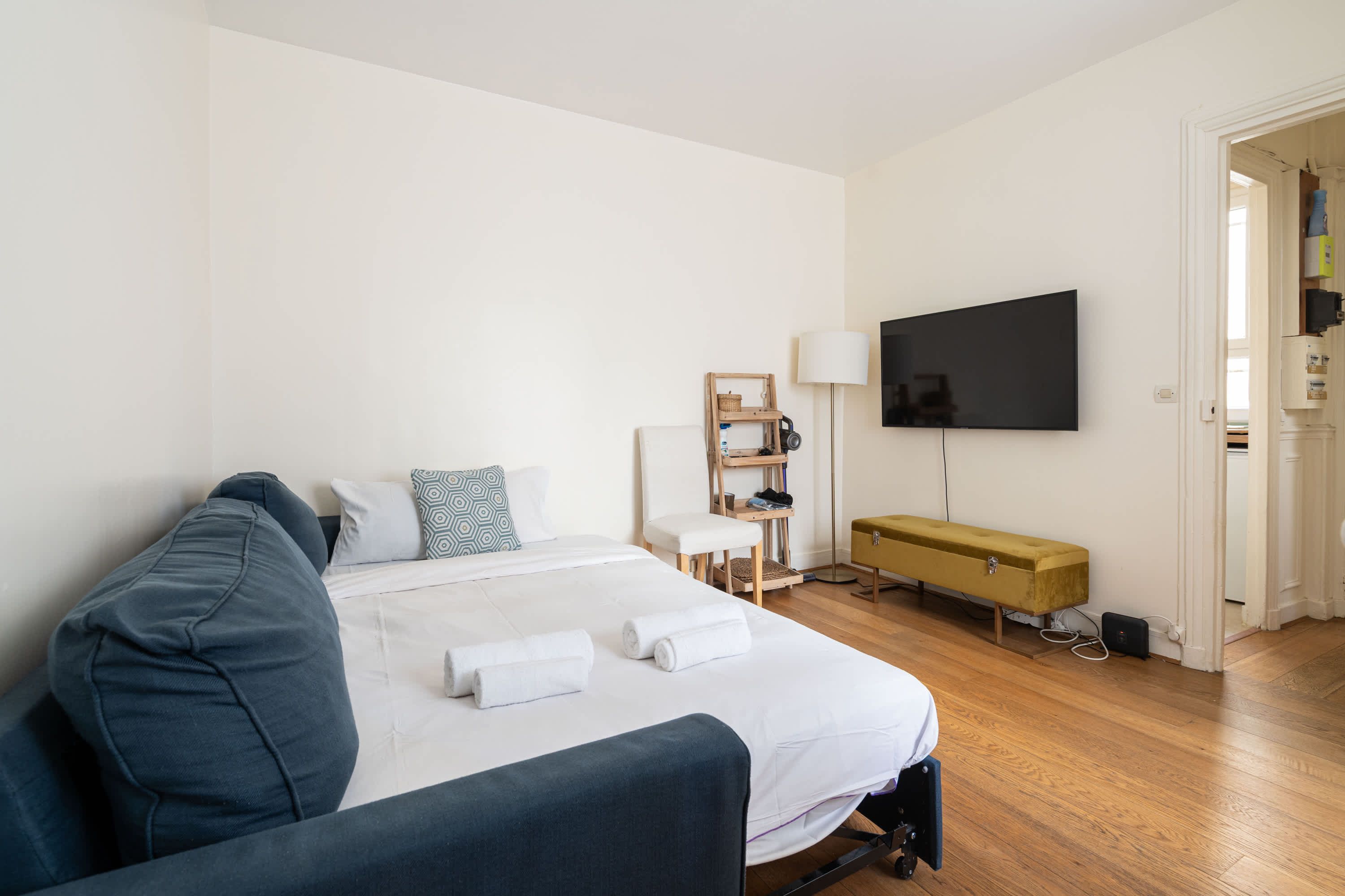 Elegant Parisian apartments with bright living areas, cozy bedrooms, and fully equipped kitchens.